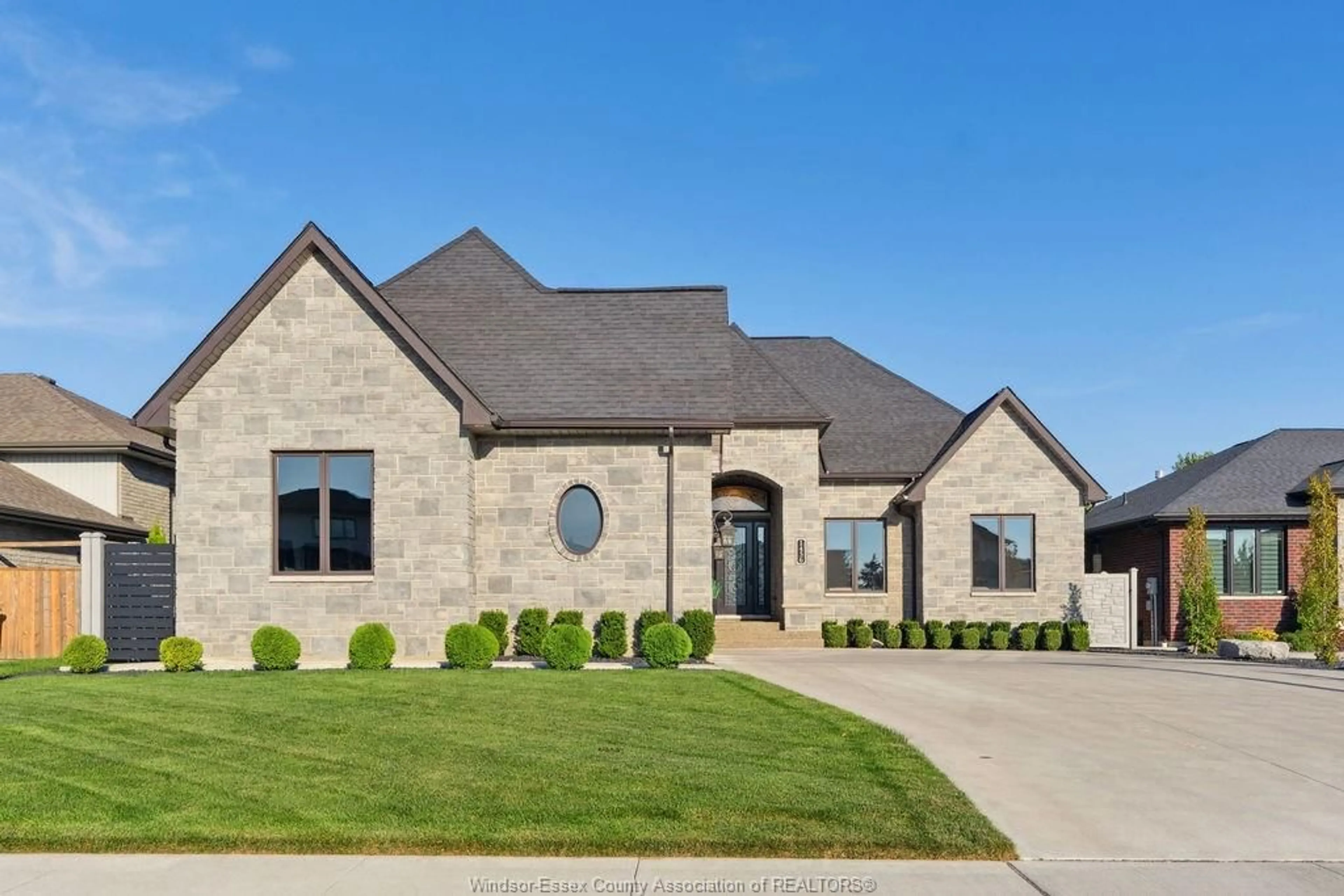 Home with brick exterior material, street for 1456 MULLINS Dr, Lakeshore Ontario N0R 1V0