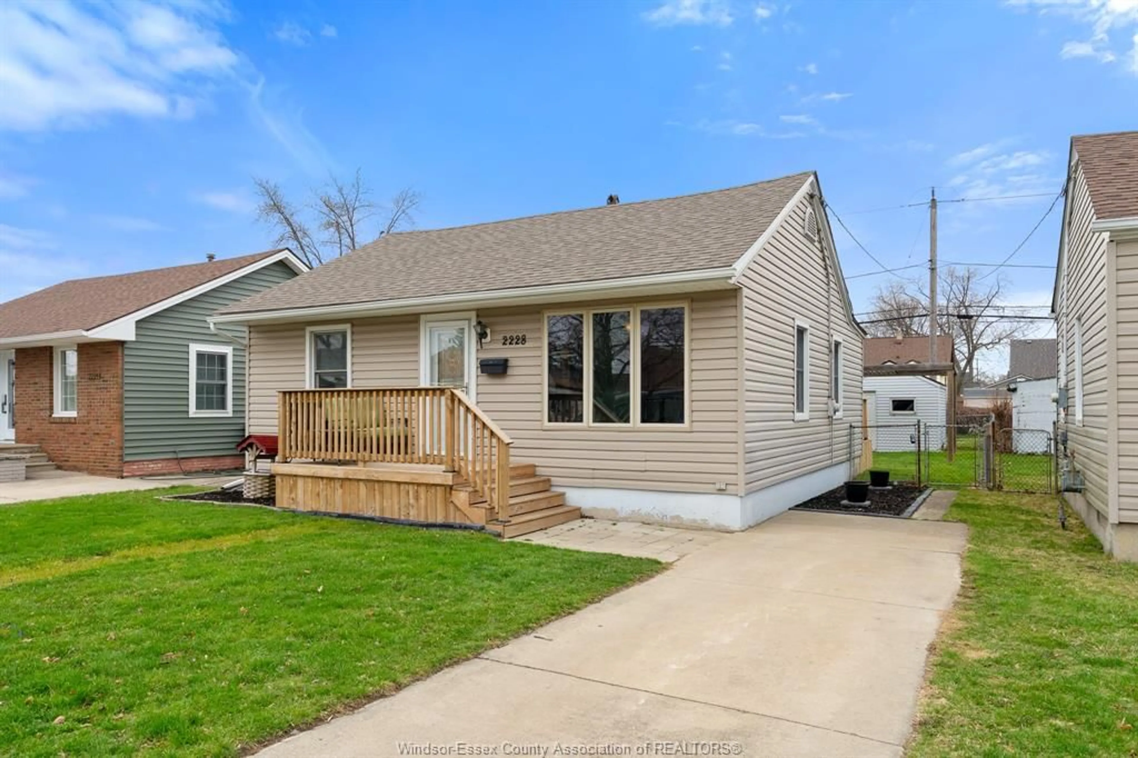 Home with vinyl exterior material, street for 2228 Elsmere Ave, Windsor Ontario N8W 2C6