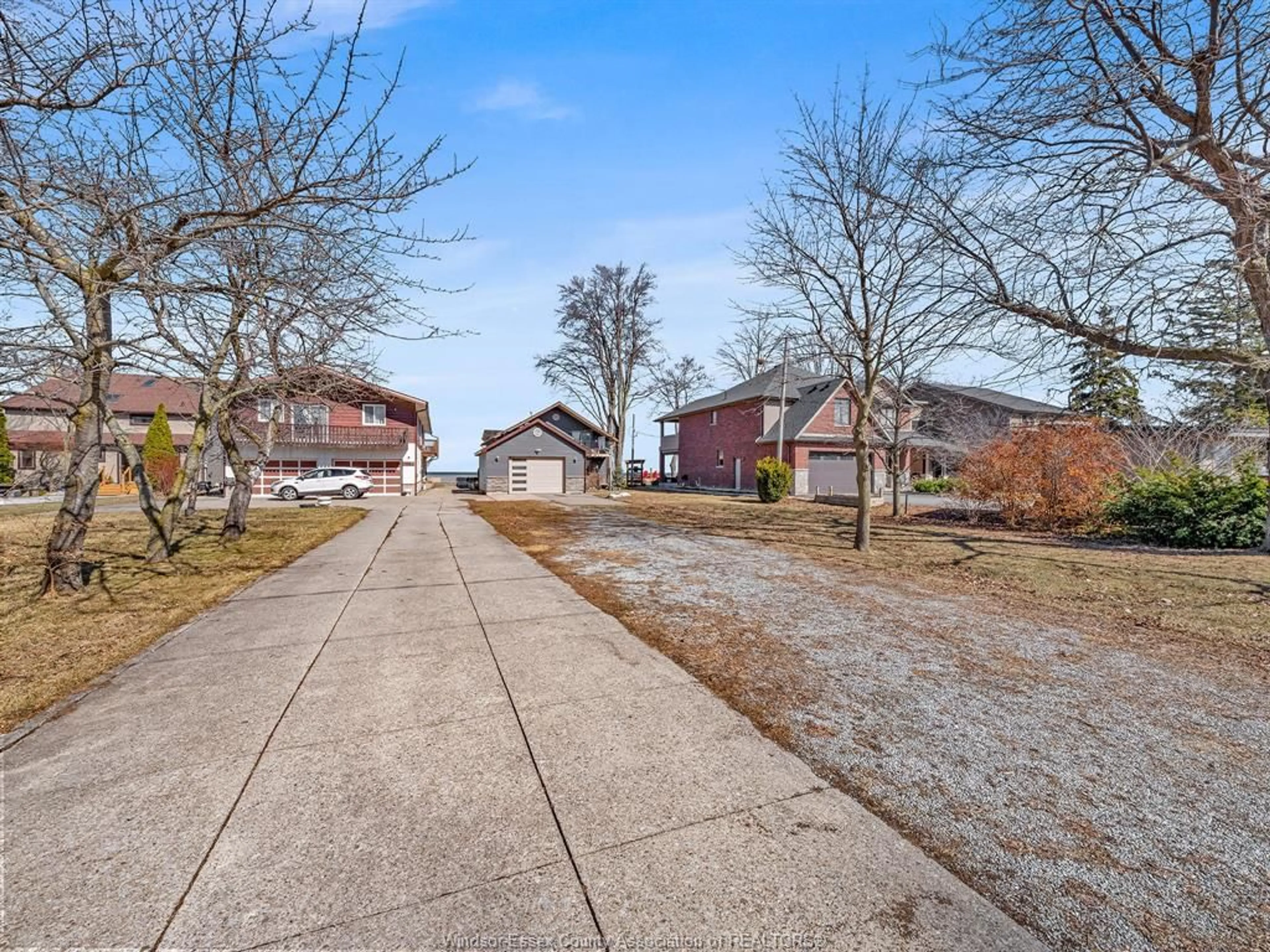 A pic from outside/outdoor area/front of a property/back of a property/a pic from drone, street for 1206 SHORELINE Ave, Lakeshore Ontario N0R 1A0