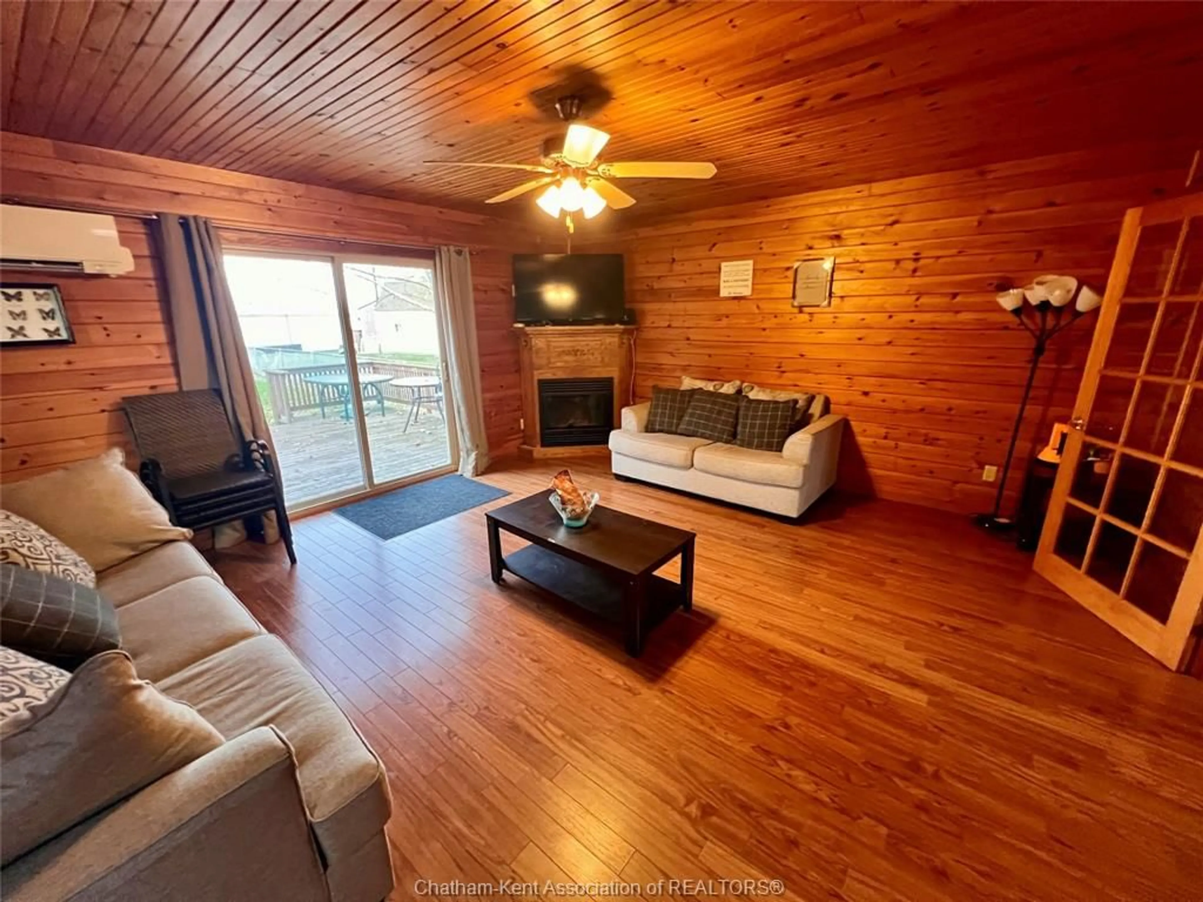 Living room with furniture, wood/laminate floor for 3 Stass Lane, Erieau Ontario N0P 1N0