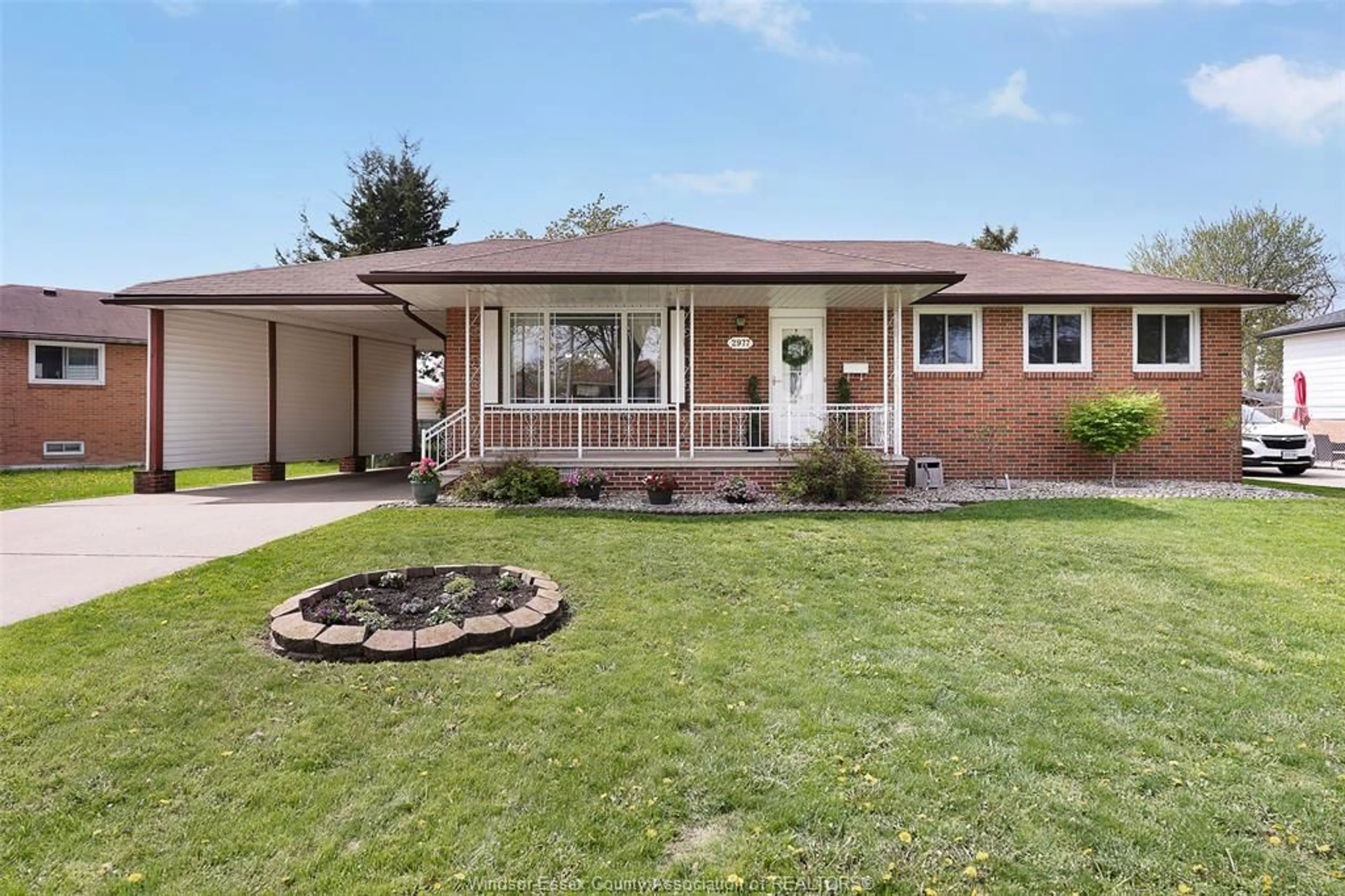 Home with brick exterior material, street for 2977 SCOTIA Dr, Windsor Ontario N8T 2G7