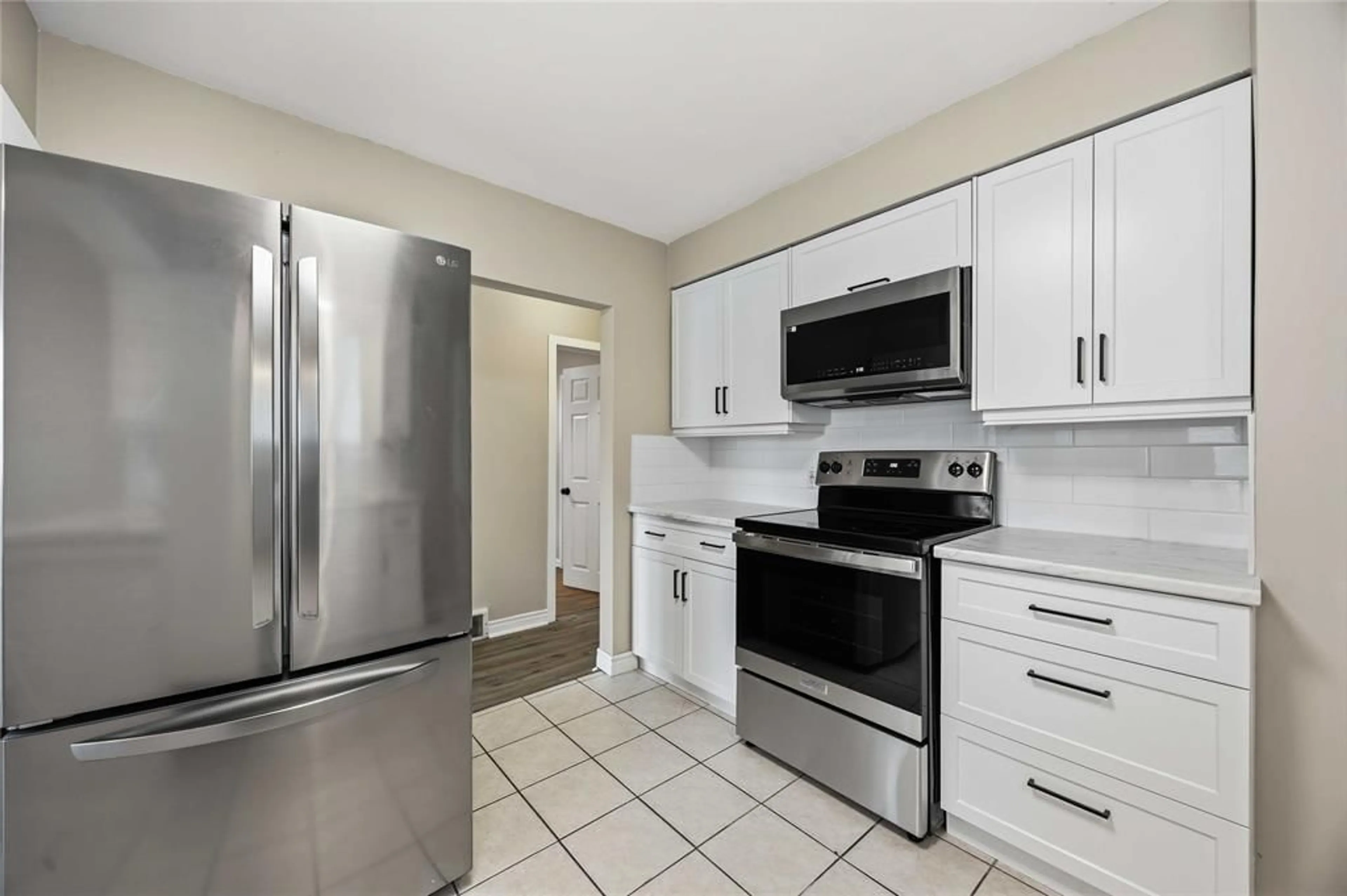 Standard kitchen, ceramic/tile floor for 1010 MEIGHEN Cres, Sarnia Ontario N7S 1A8