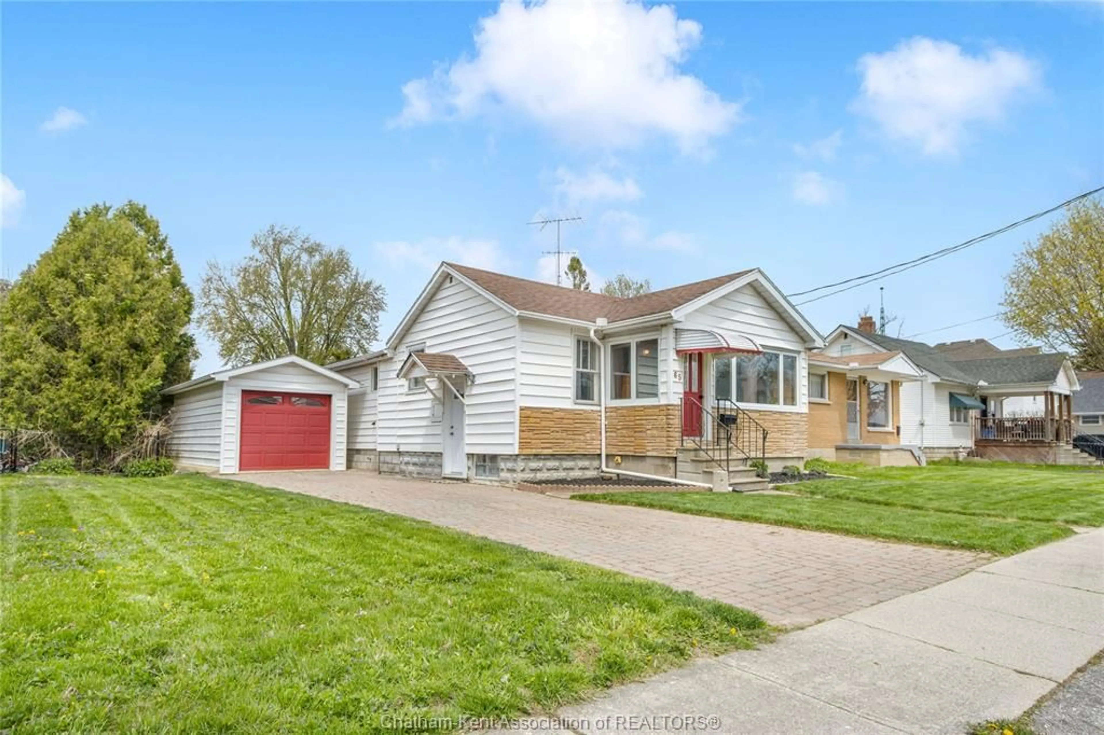 Home with vinyl exterior material, street for 65 WILSON Ave, Chatham Ontario N7L 1K8