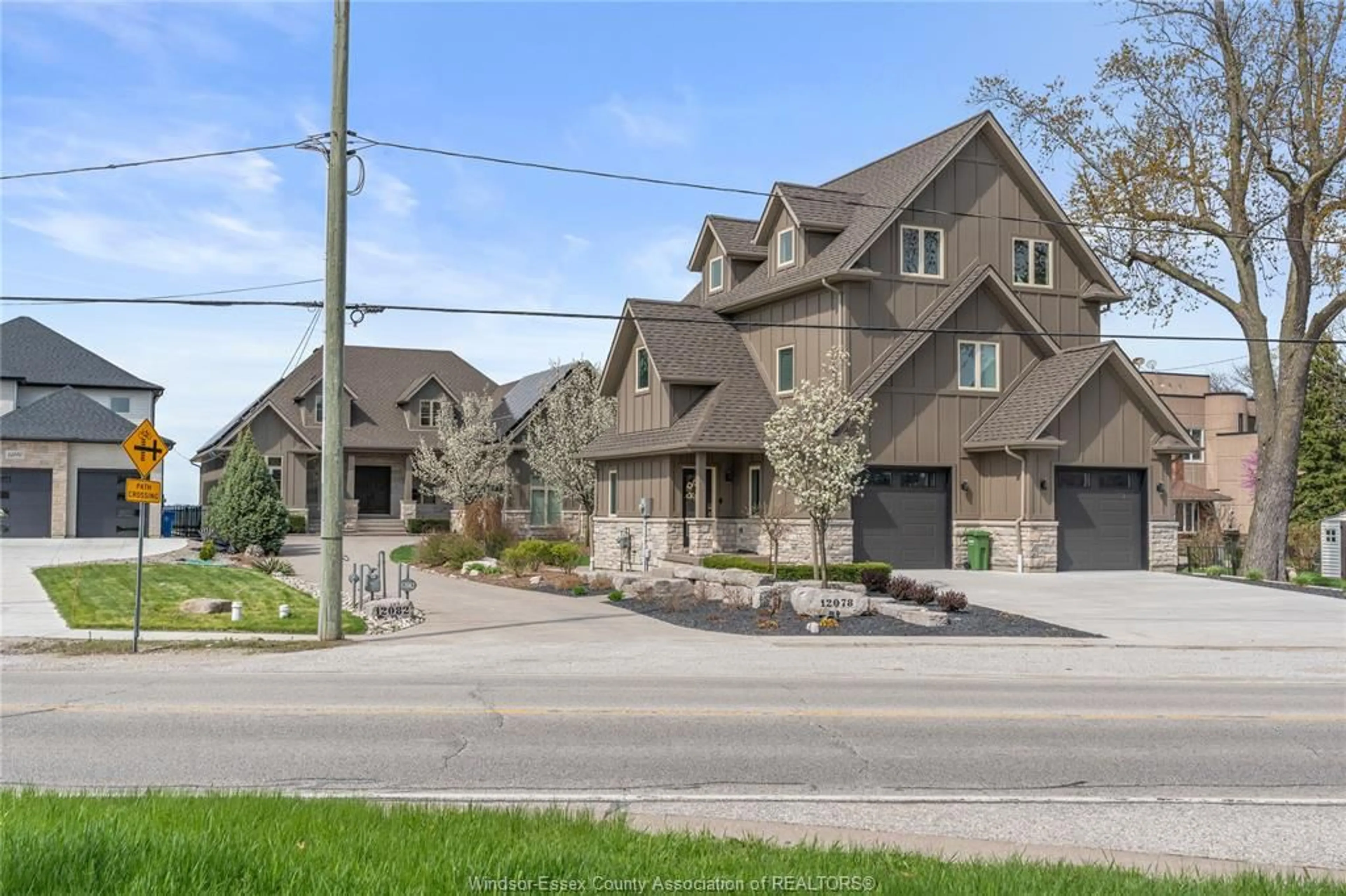 Home with brick exterior material, street for 12082 & 12078 Riverside Dr, Tecumseh Ontario N8P 1A9