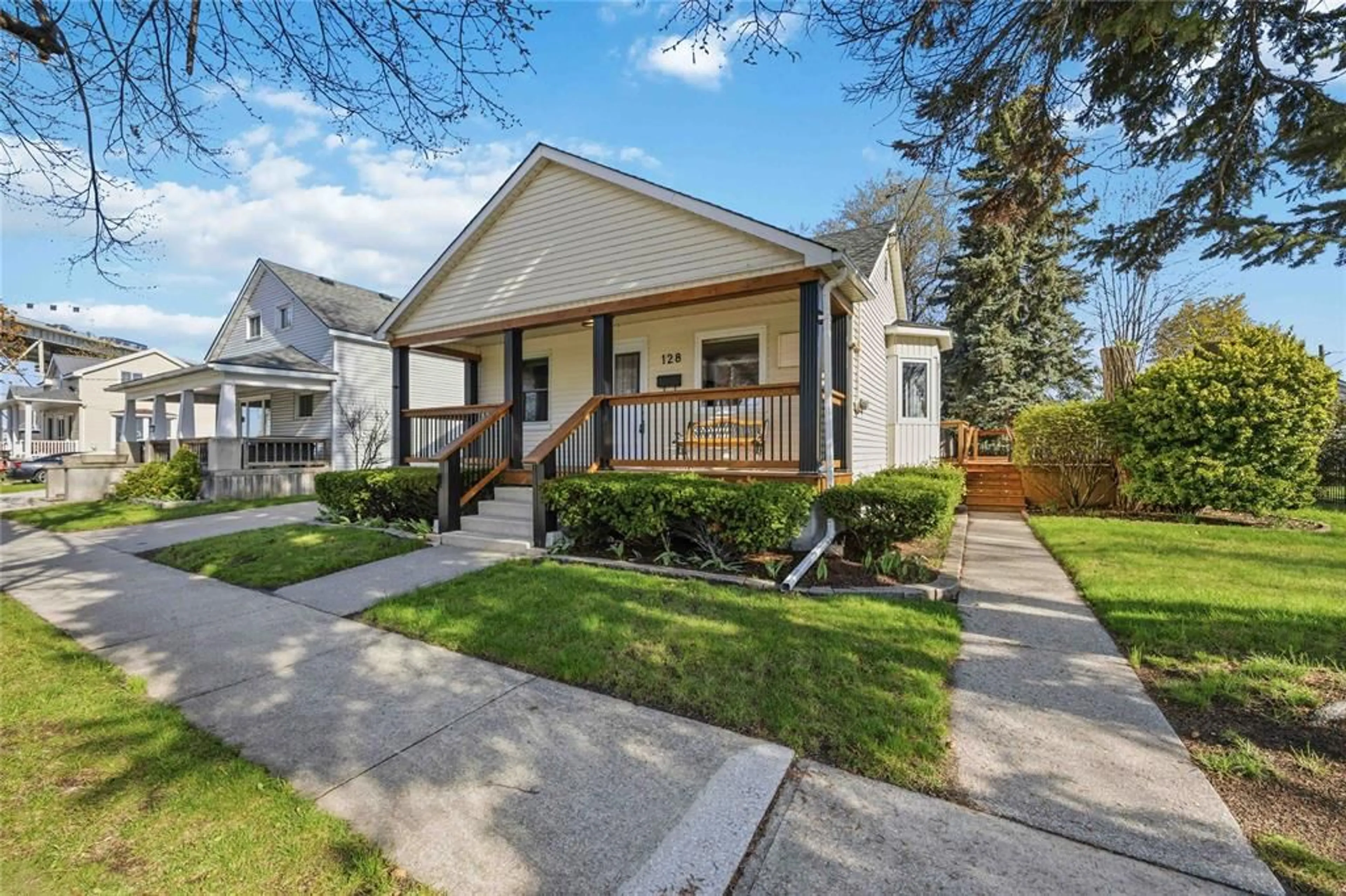 Home with vinyl exterior material, street for 128 ALEXANDRA Ave, Point Edward Ontario N7V 1C2