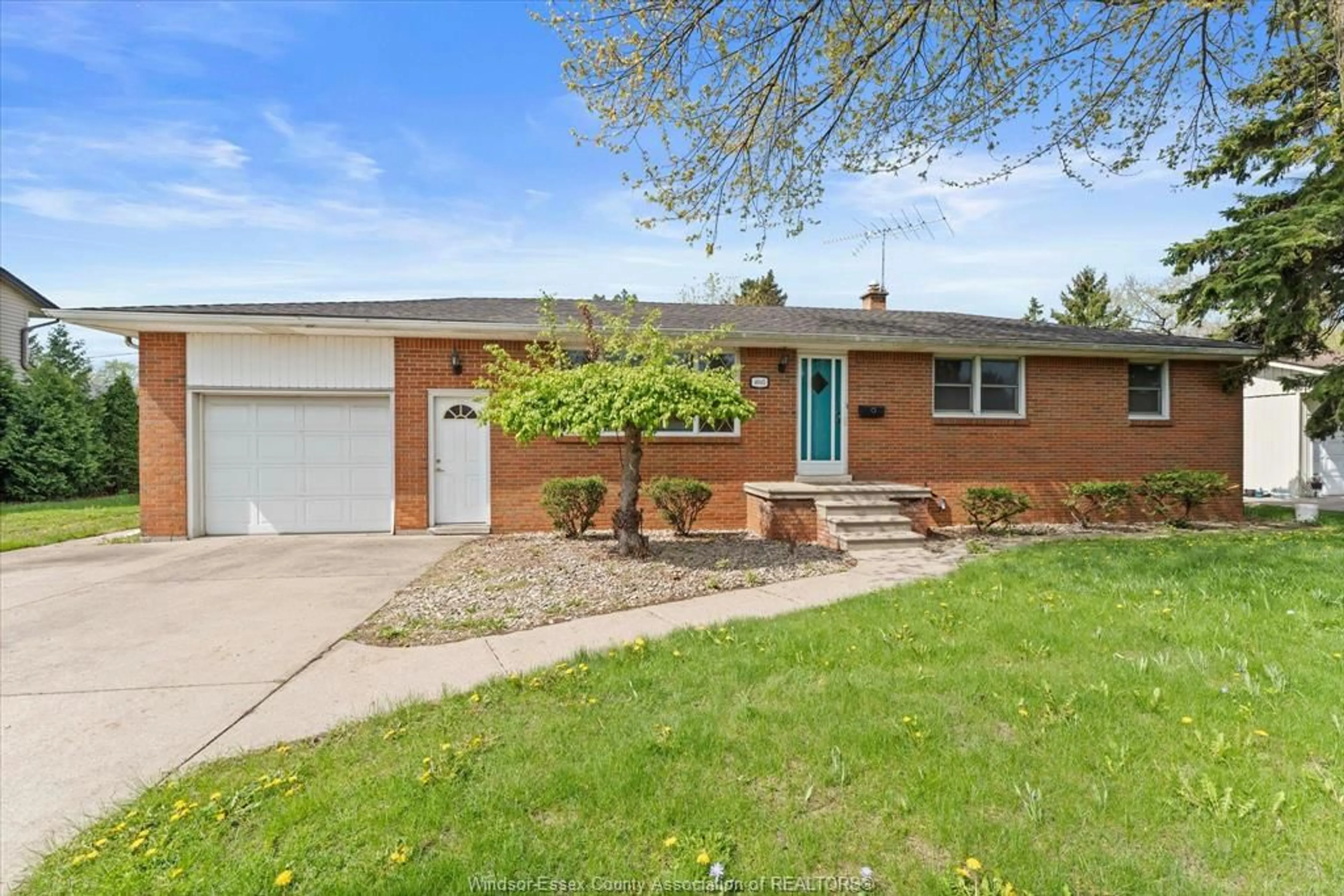 Home with brick exterior material, street for 4045 DOUGALL, Windsor Ontario N9G 1X4