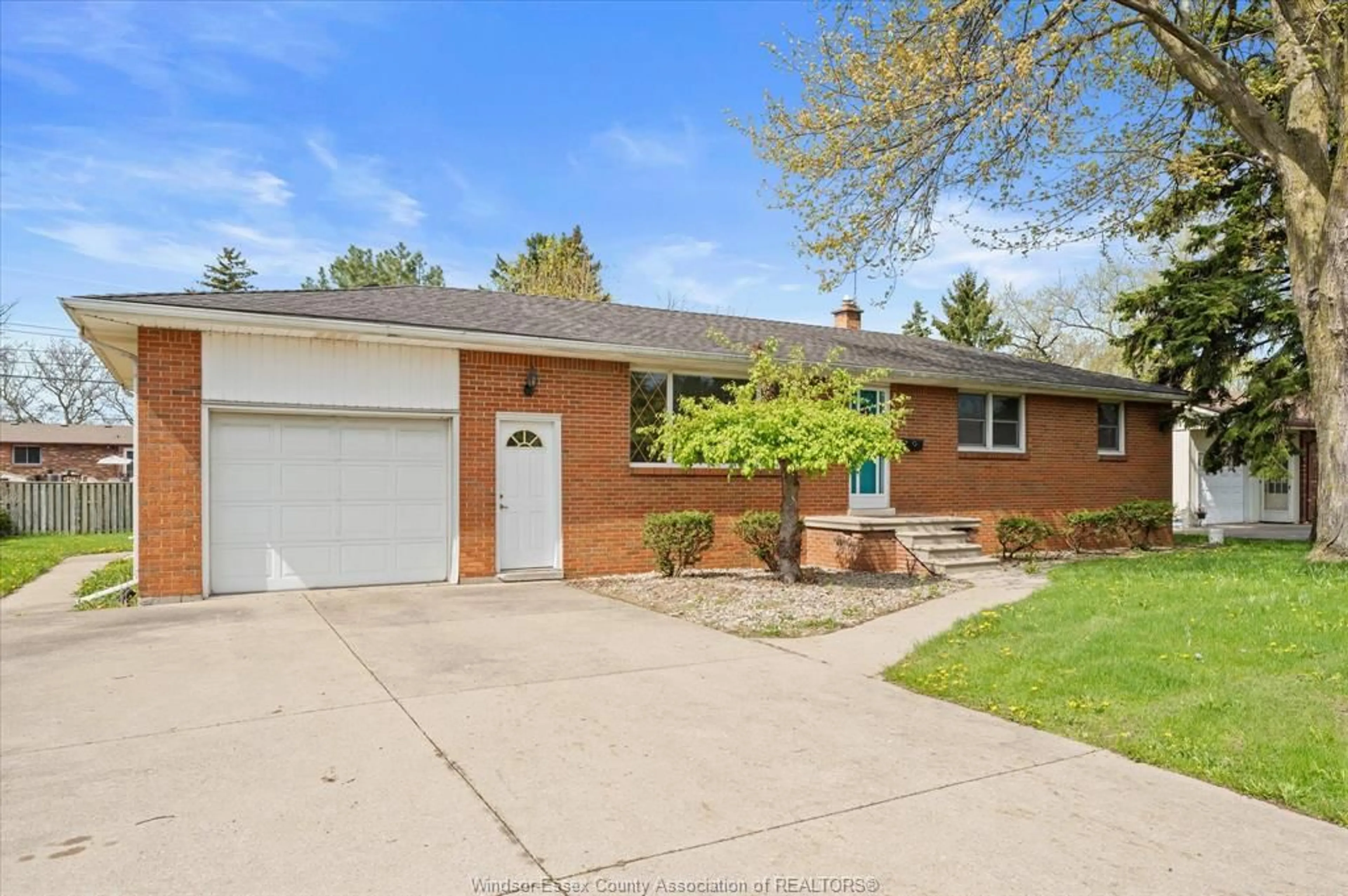 Home with brick exterior material, street for 4045 DOUGALL, Windsor Ontario N9G 1X4
