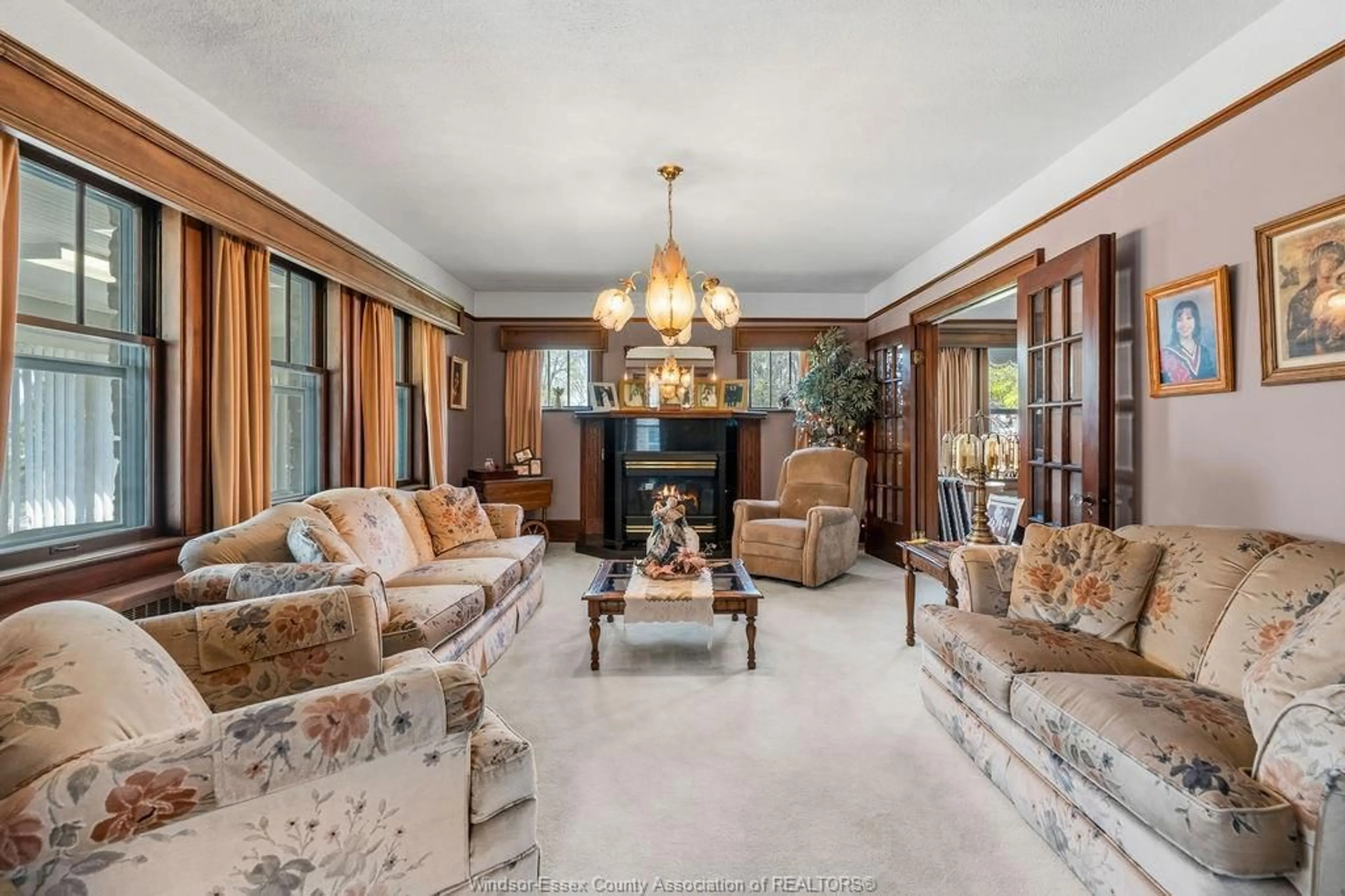 Living room with furniture, carpet floor for 28 ALBERT St, Leamington Ontario N8H 3J8