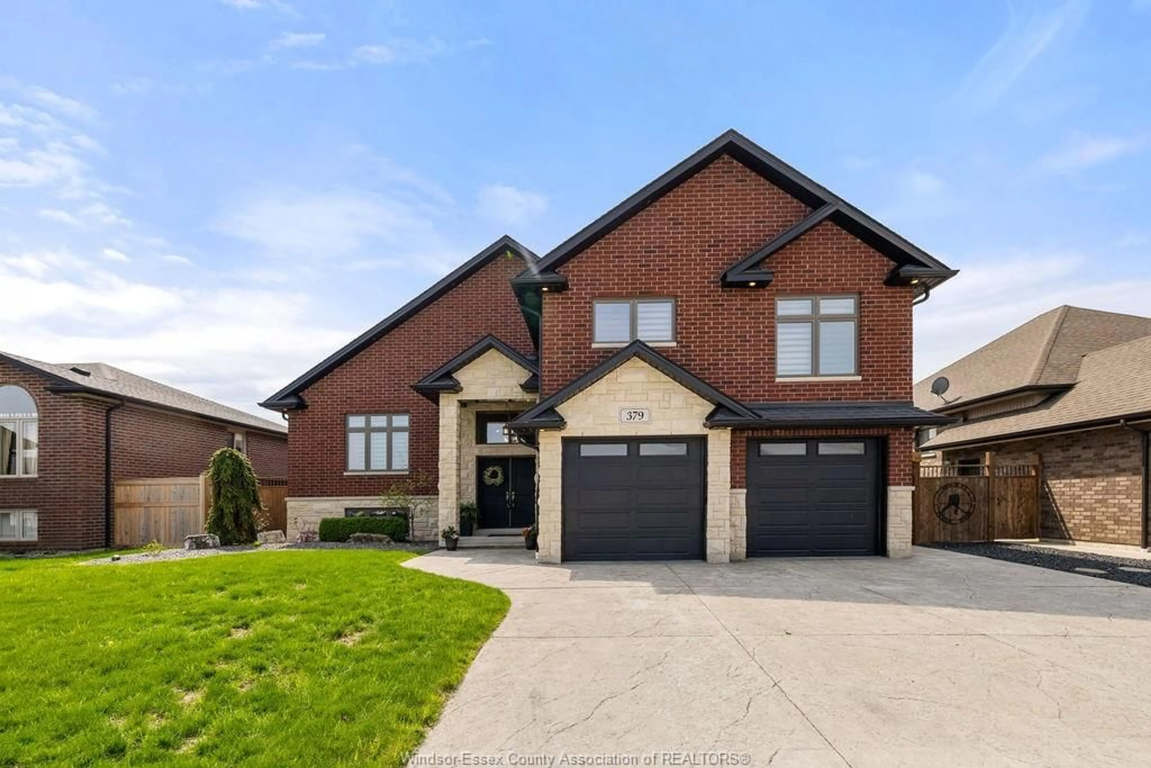 Home with brick exterior material, street for 379 PIROLI Cres, Lakeshore Ontario N8L 0R7