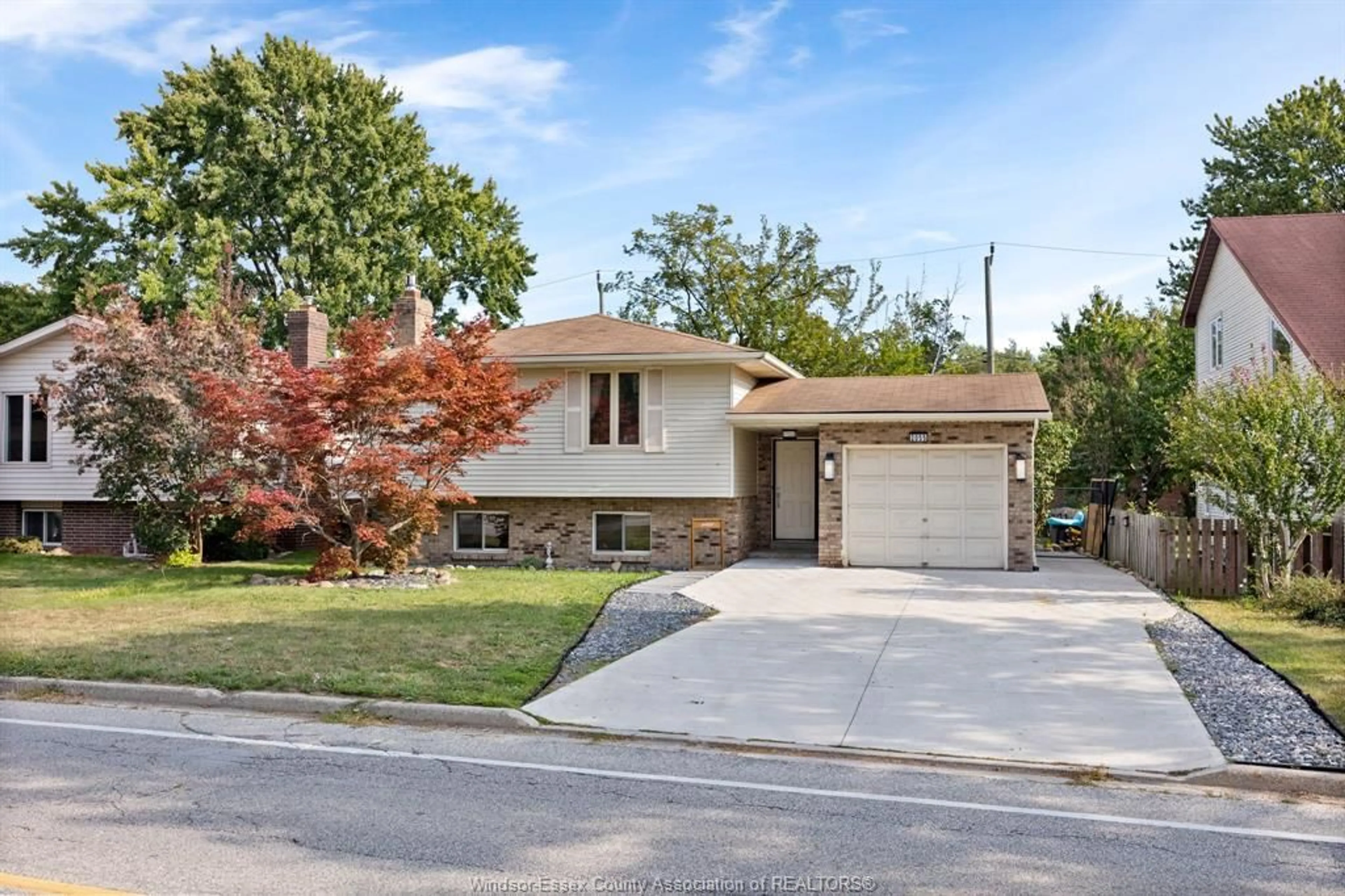 Home with brick exterior material, street for 2055 GRAND MARAIS Rd, Windsor Ontario N9E 4K1