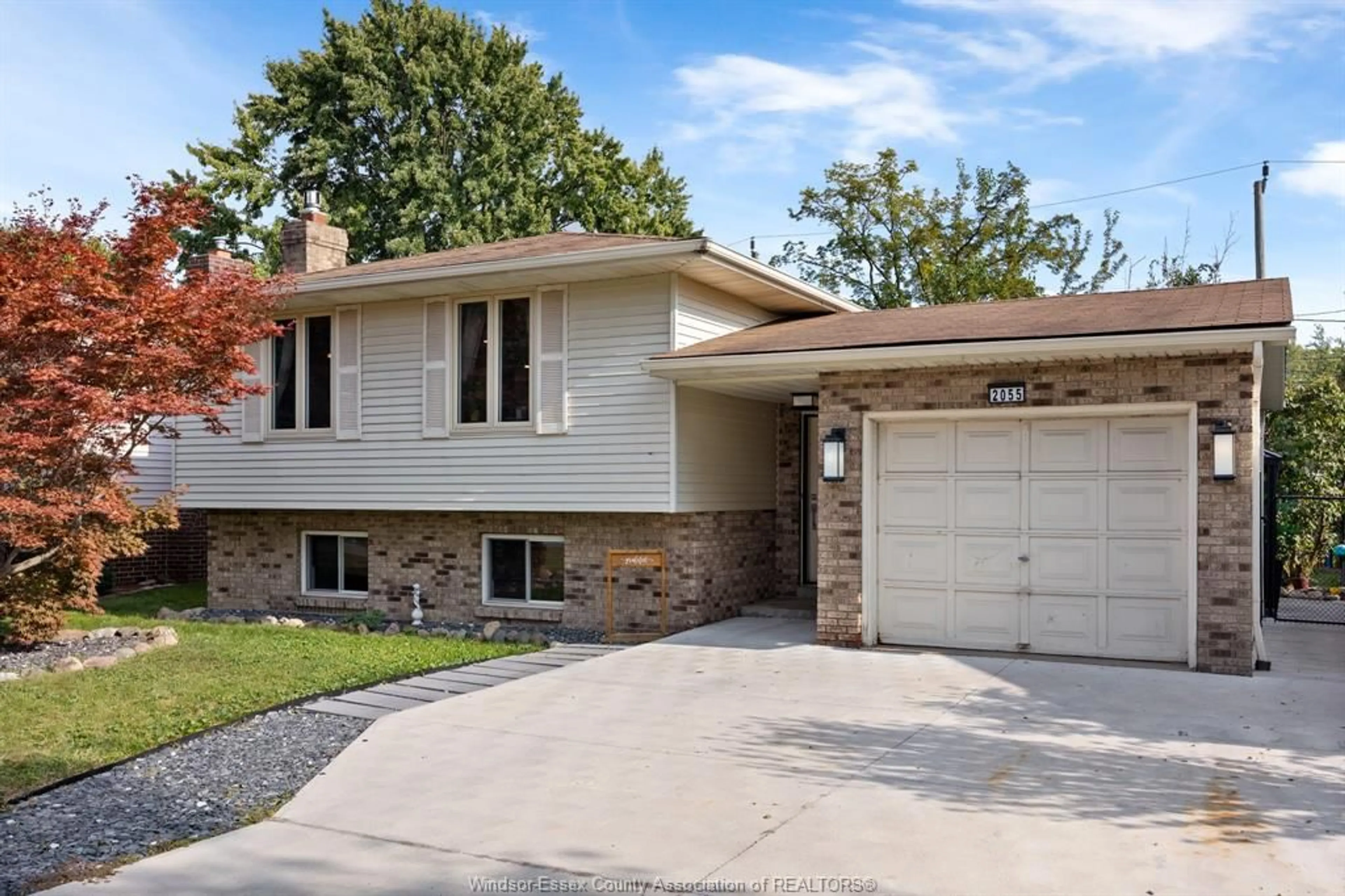 Home with vinyl exterior material, street for 2055 GRAND MARAIS Rd, Windsor Ontario N9E 4K1