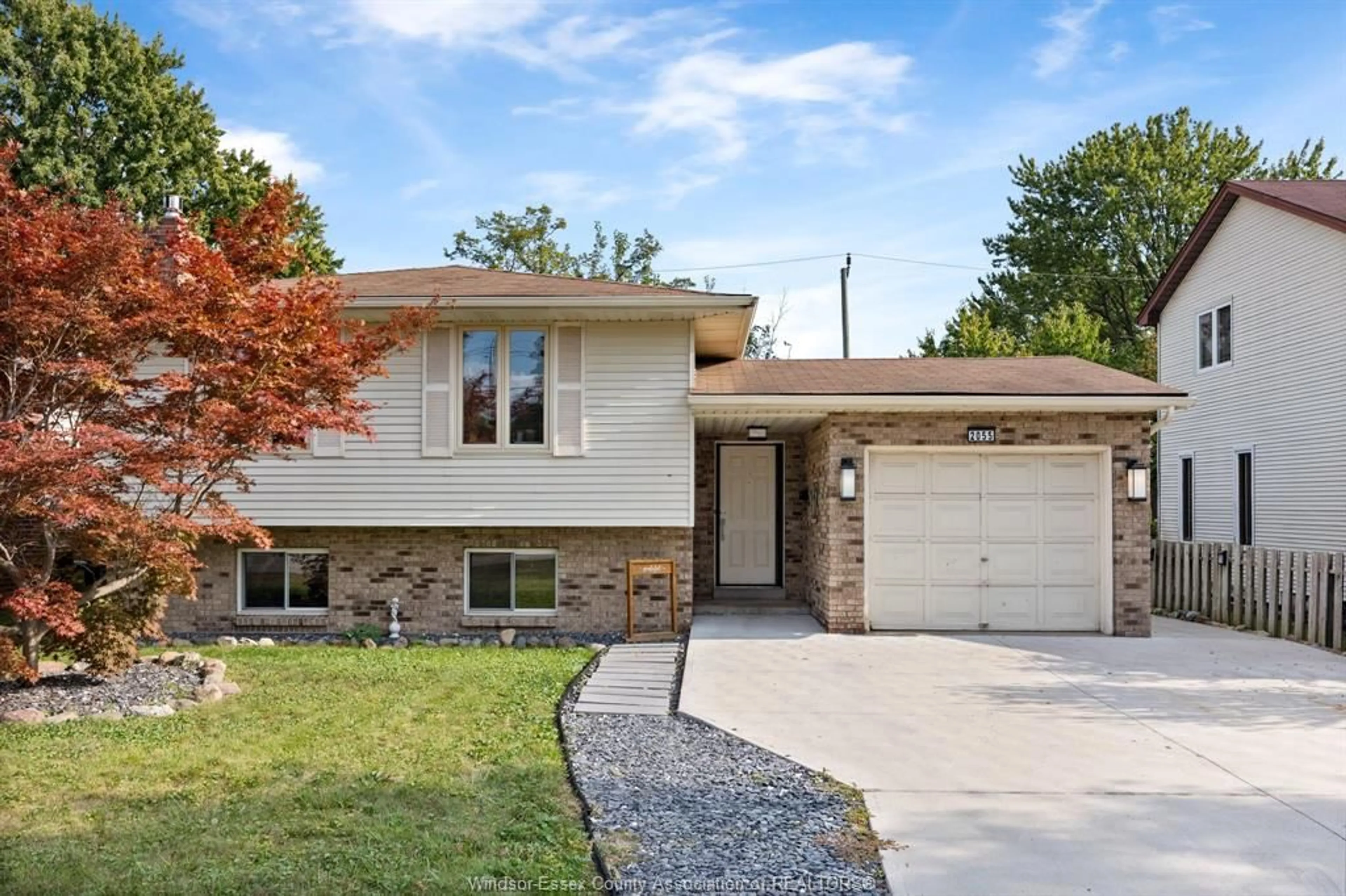 Home with brick exterior material, street for 2055 GRAND MARAIS Rd, Windsor Ontario N9E 4K1