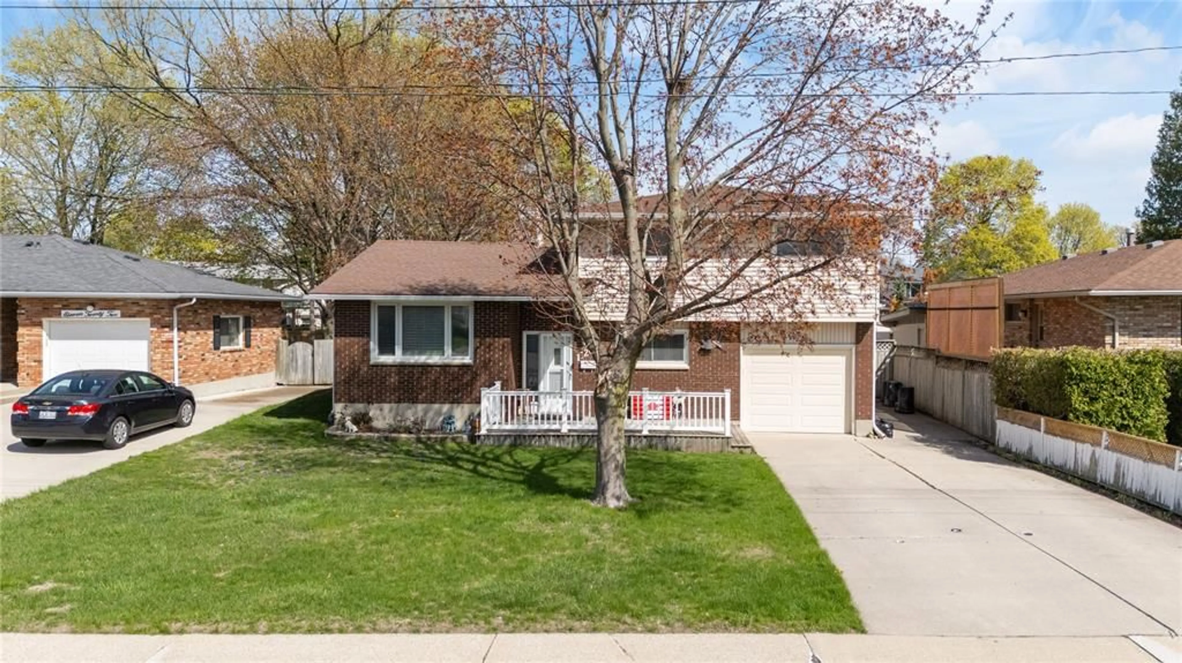 Home with vinyl exterior material, street for 1126 Cathcart Blvd, Sarnia Ontario N7S 2H5