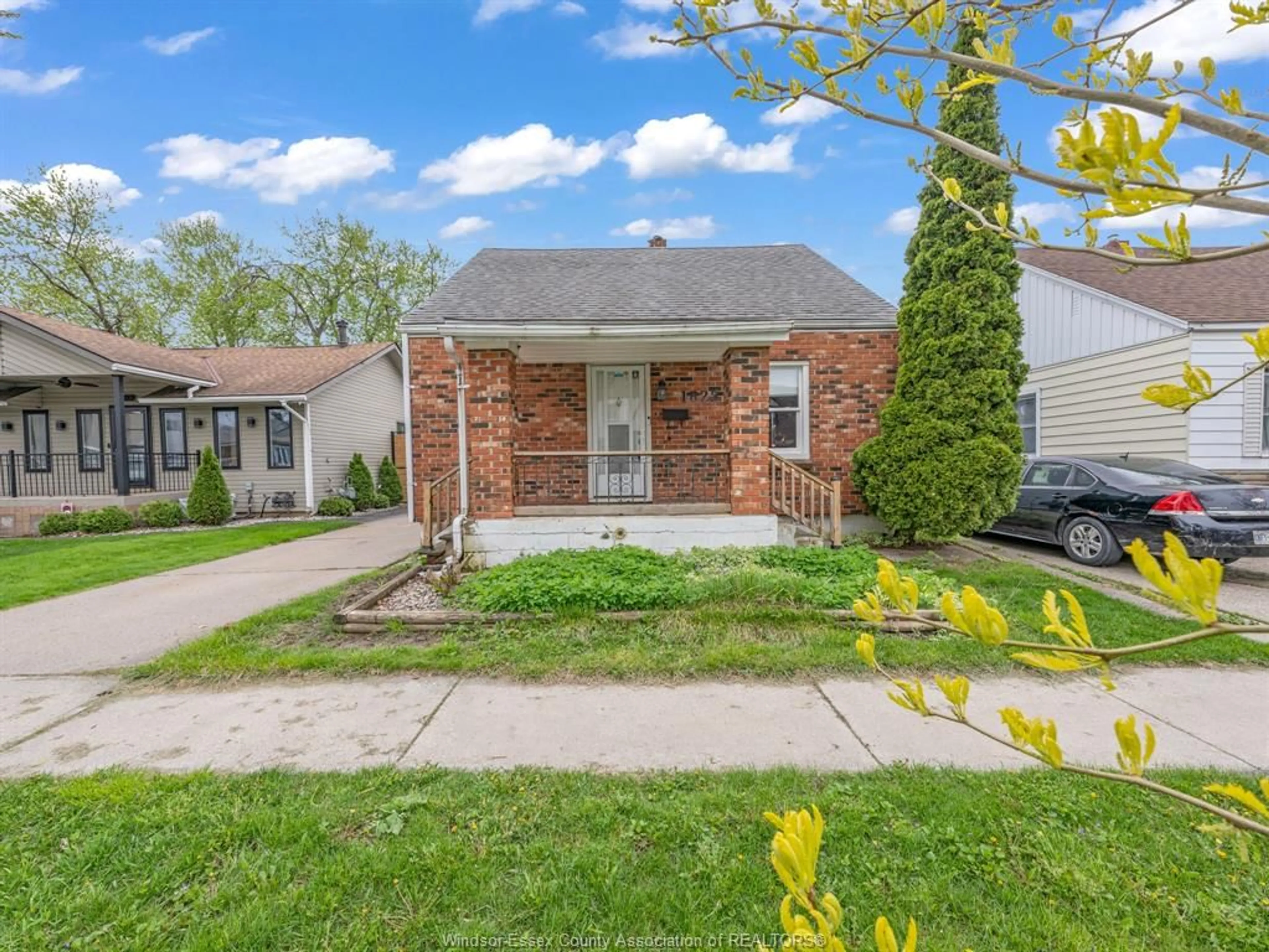 Home with brick exterior material, street for 1825 TOURANGEAU Rd, Windsor Ontario N8W 4N2
