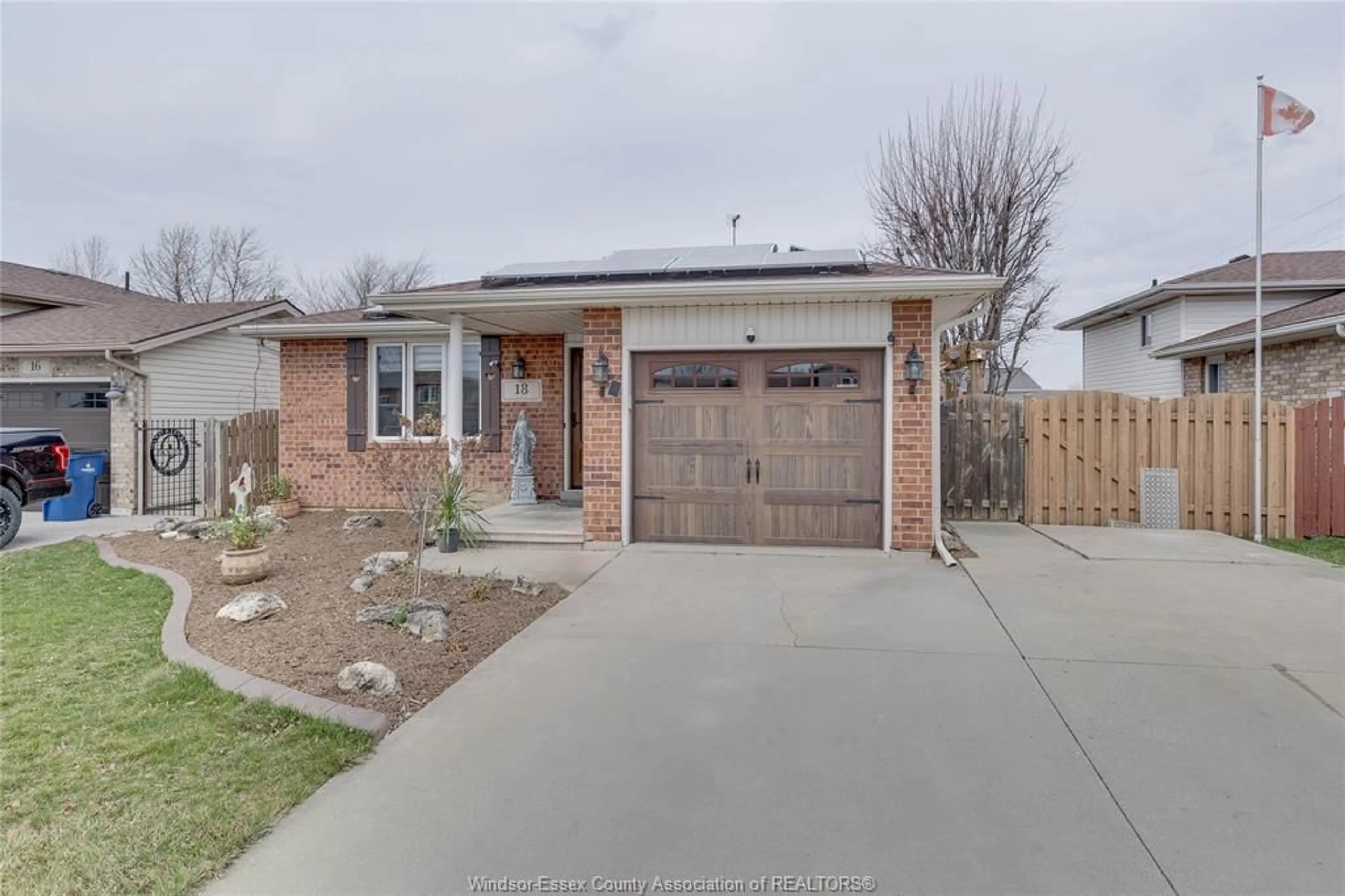 Home with brick exterior material, street for 18 AZAR Ave, Tilbury Ontario N0P 2L0