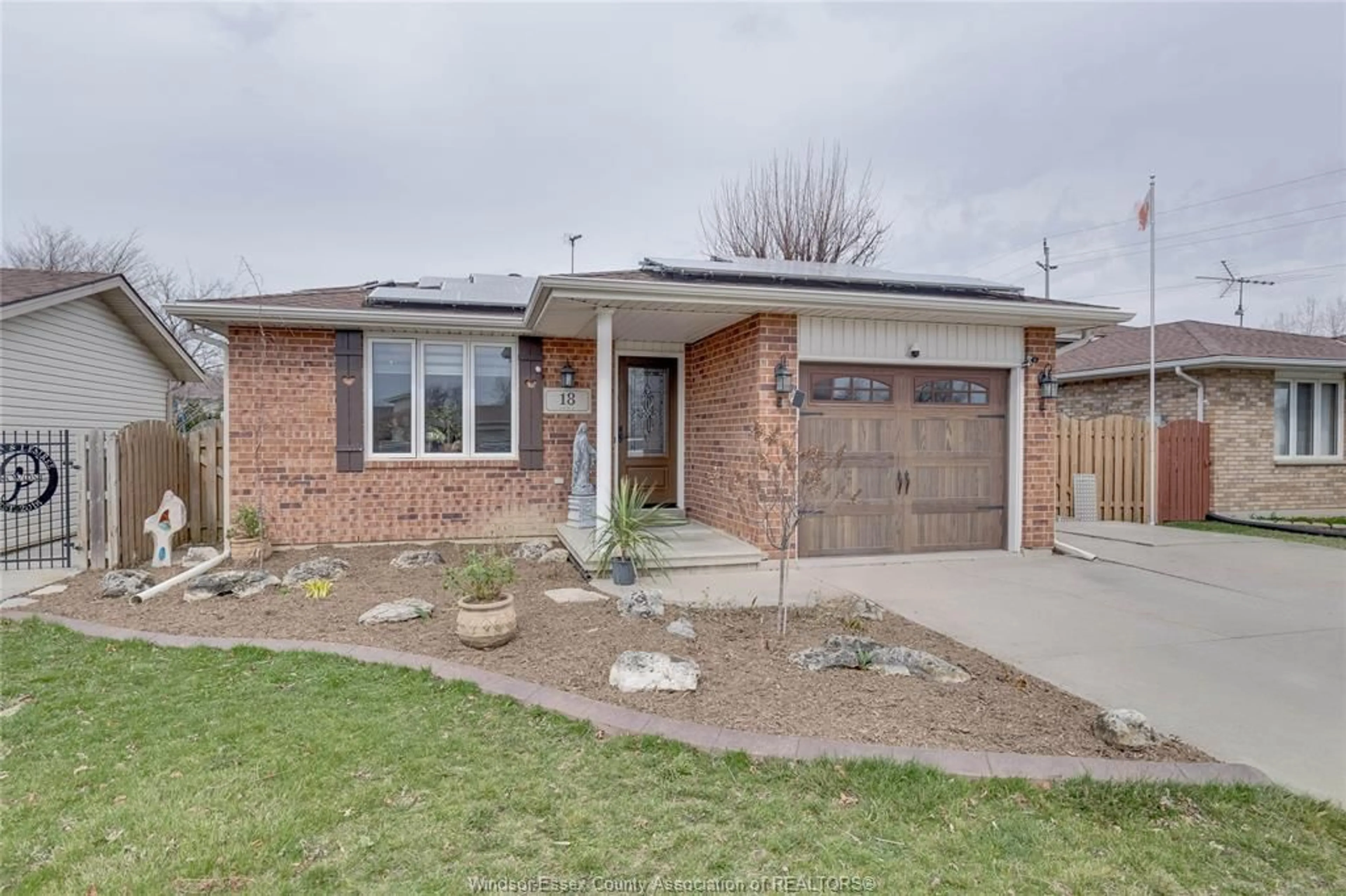 Home with brick exterior material, street for 18 AZAR Ave, Tilbury Ontario N0P 2L0