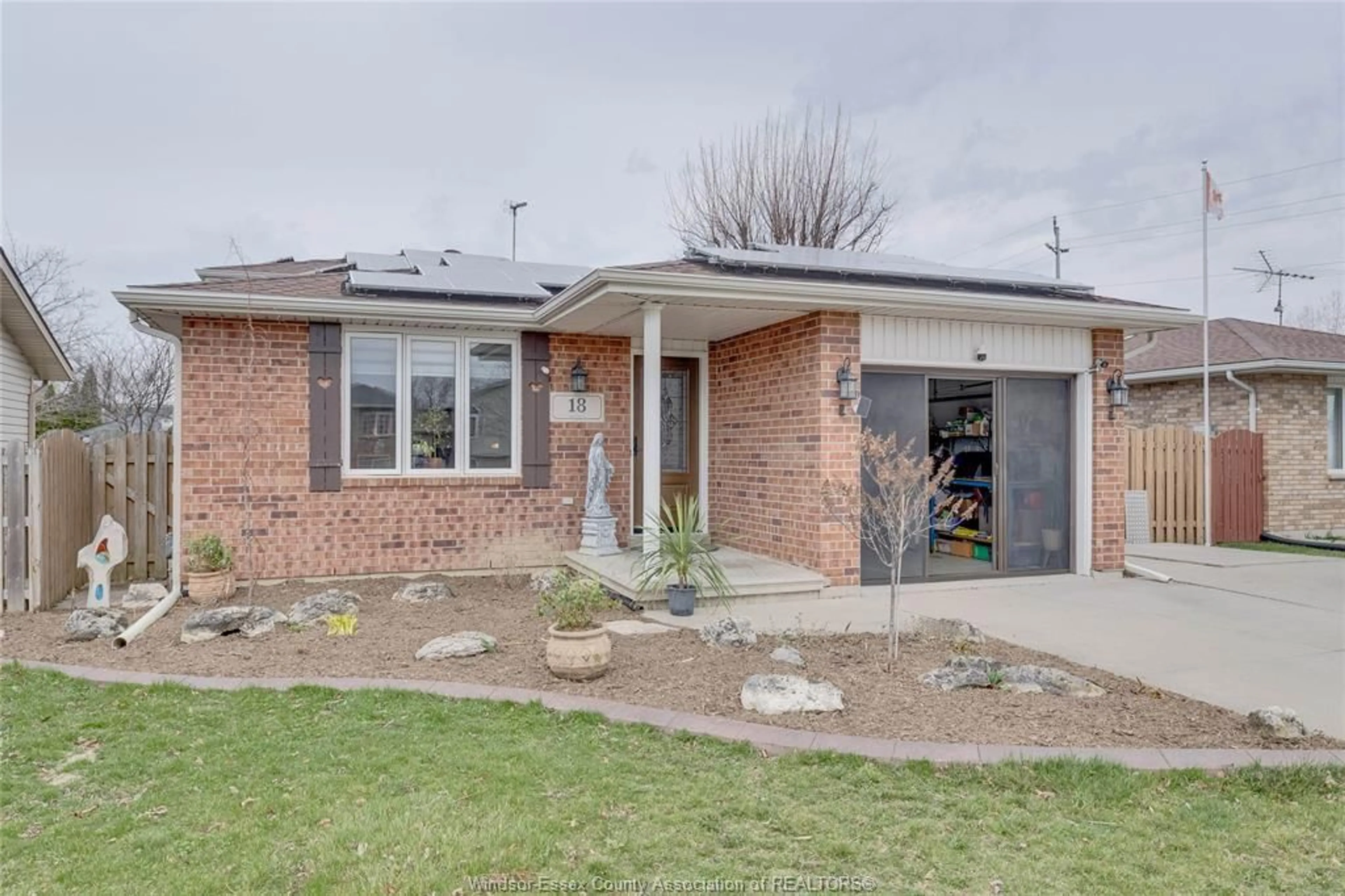 Home with brick exterior material, street for 18 AZAR Ave, Tilbury Ontario N0P 2L0