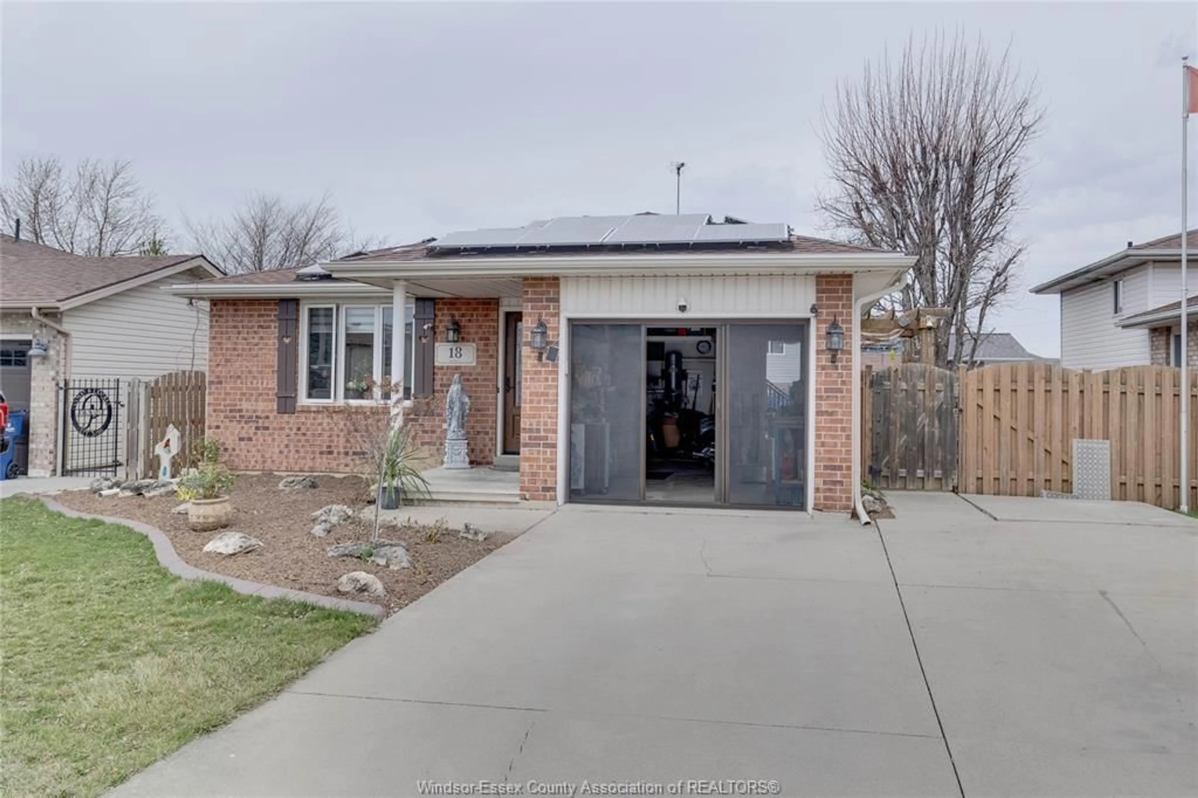 Home with brick exterior material, street for 18 AZAR Ave, Tilbury Ontario N0P 2L0
