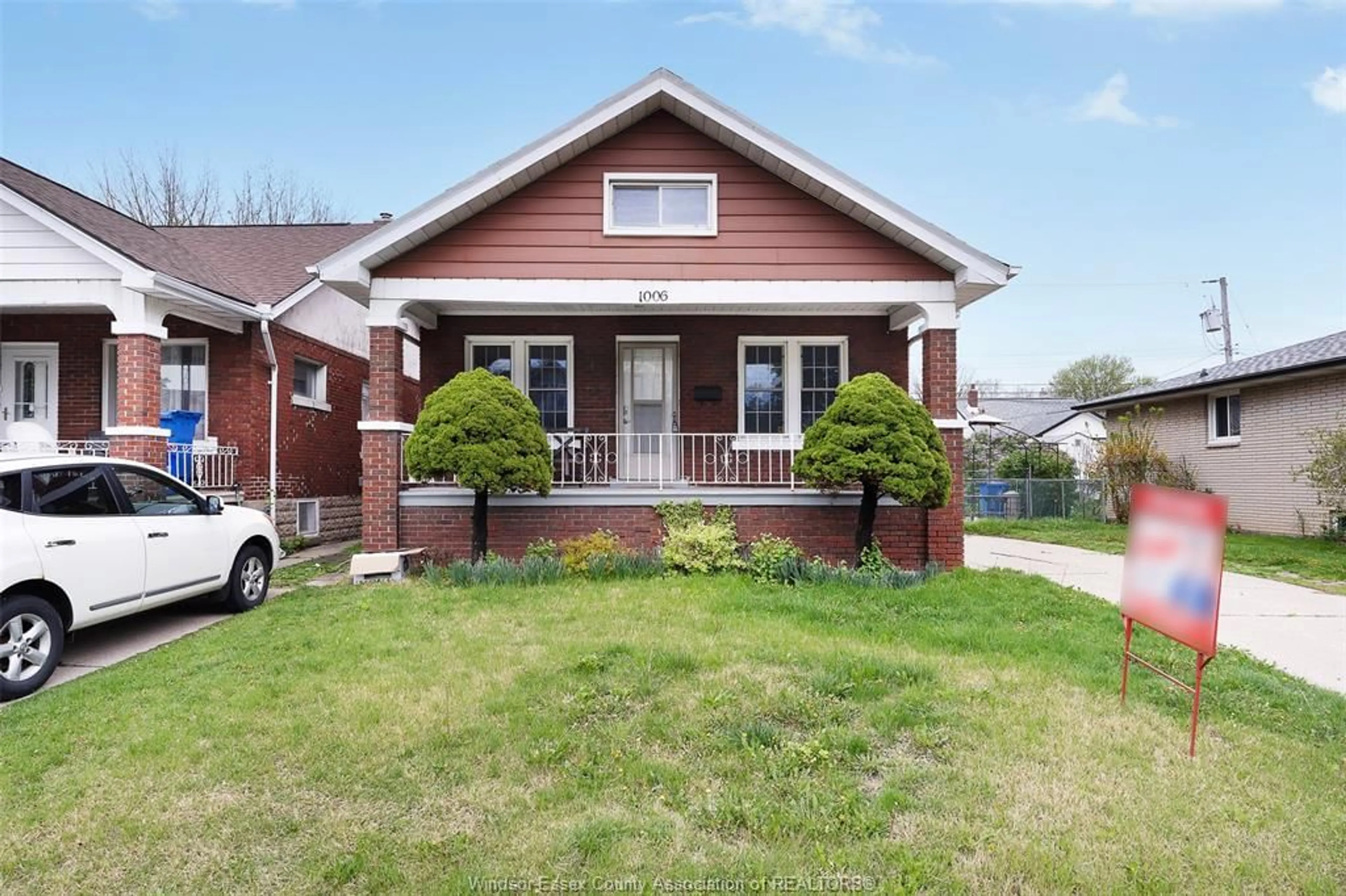 Home with brick exterior material, street for 1006 PILLETTE Rd, Windsor Ontario N8Y 3B6