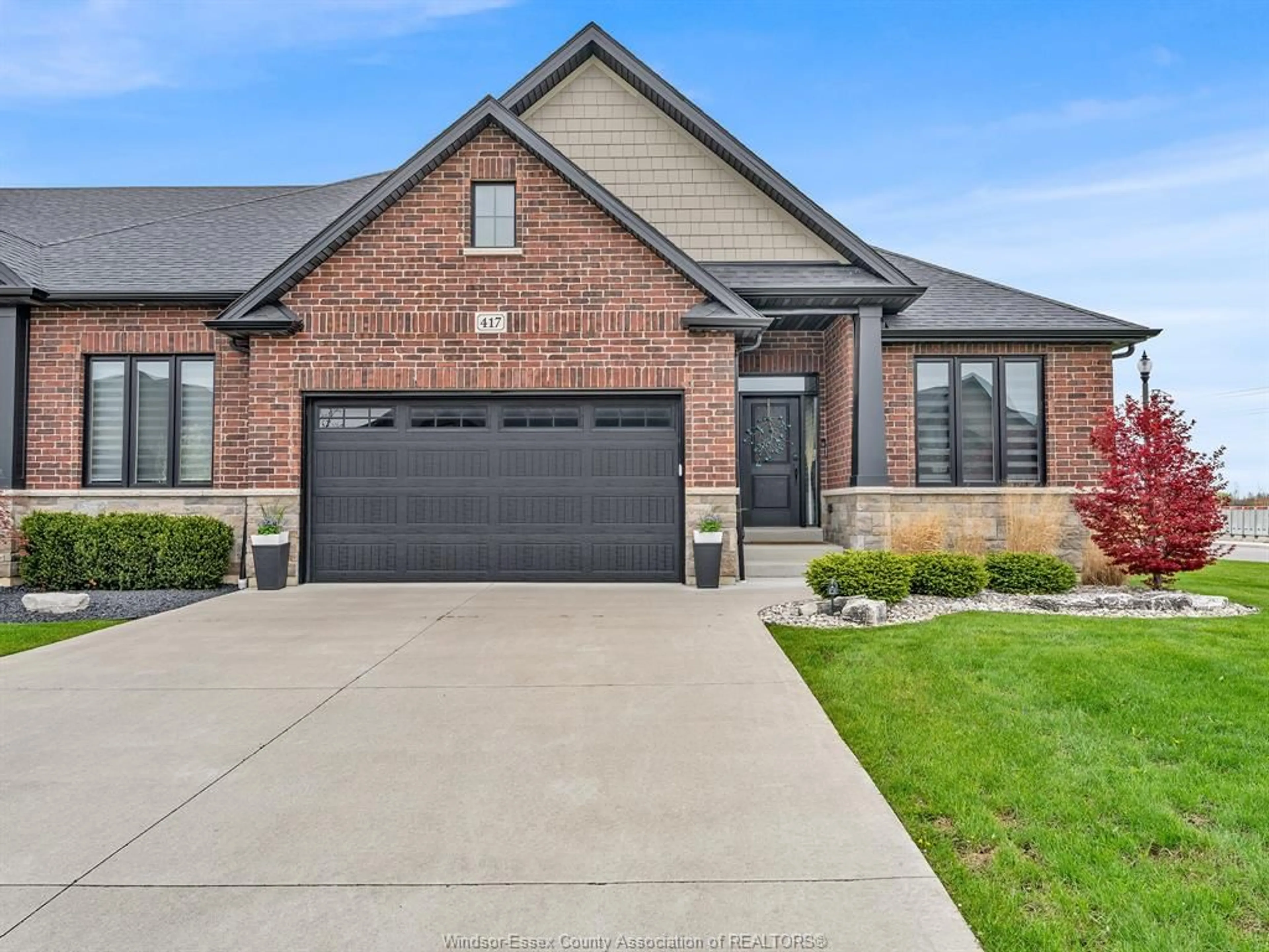 Home with brick exterior material, street for 417 BRUNMAR Cres, Lakeshore Ontario N8L 0Y2