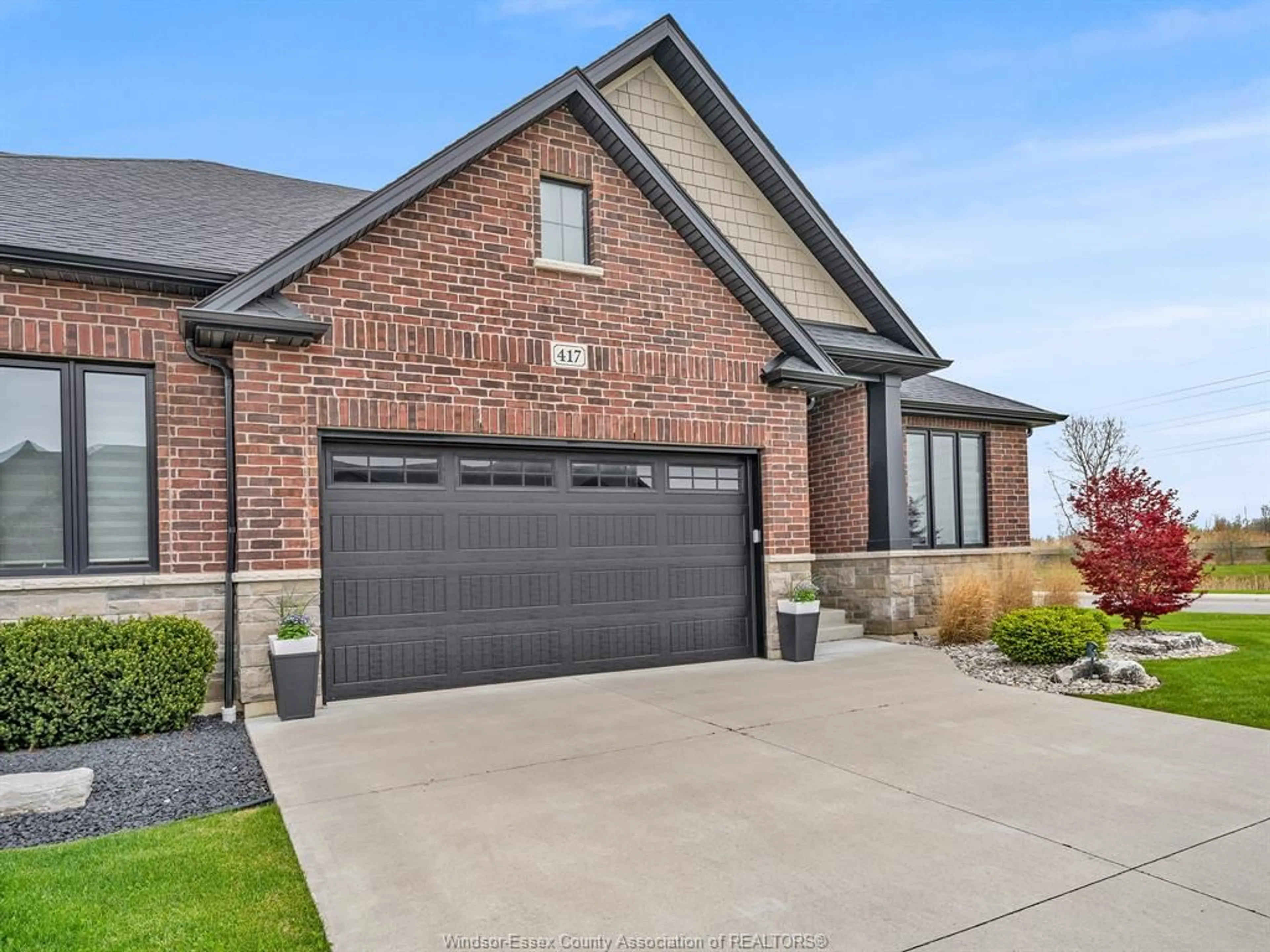 Home with brick exterior material, street for 417 BRUNMAR Cres, Lakeshore Ontario N8L 0Y2