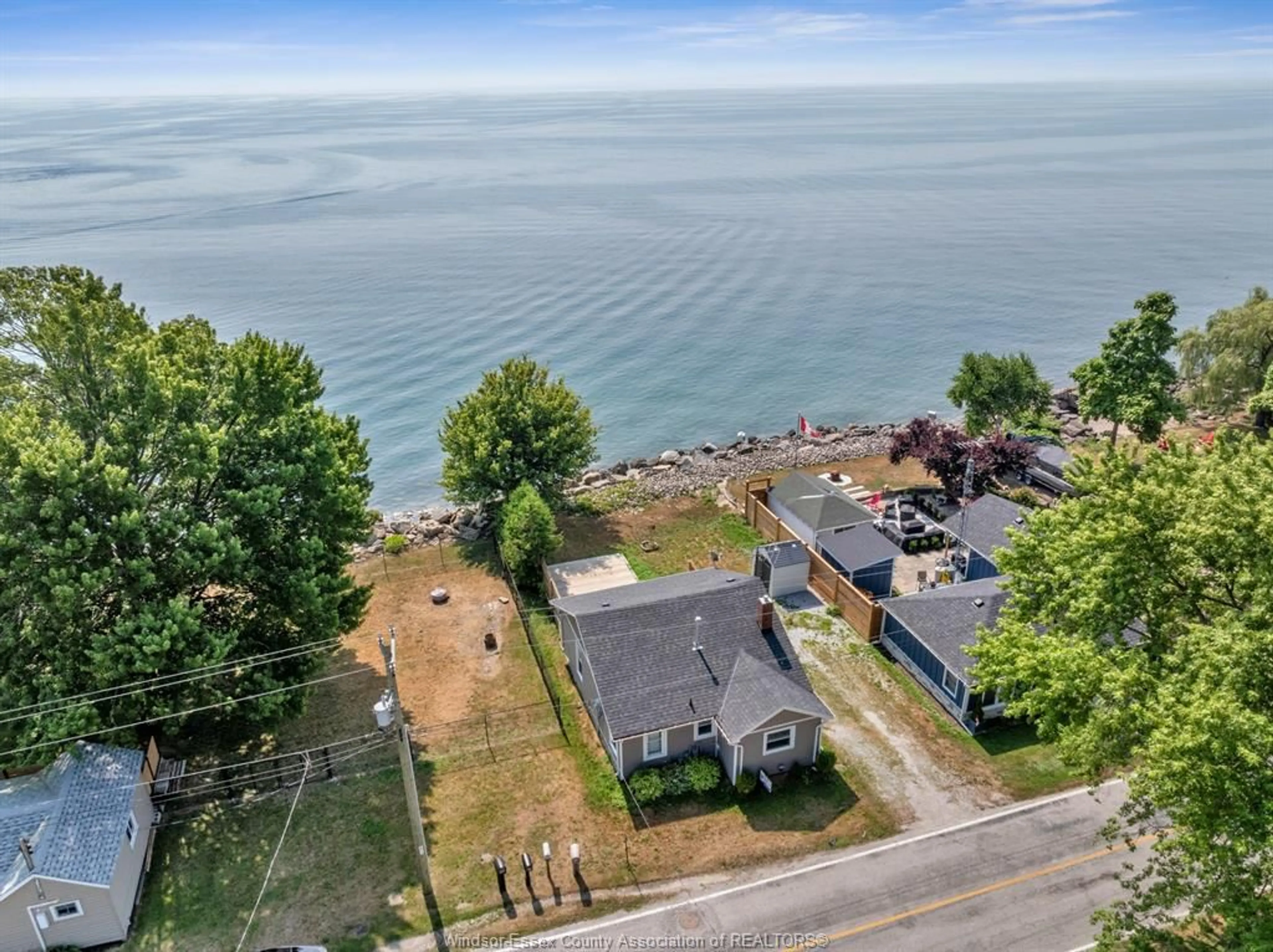 A pic from outside/outdoor area/front of a property/back of a property/a pic from drone, water/lake/river/ocean view for 32 PULLEY Rd, Leamington Ontario N0P 2P0