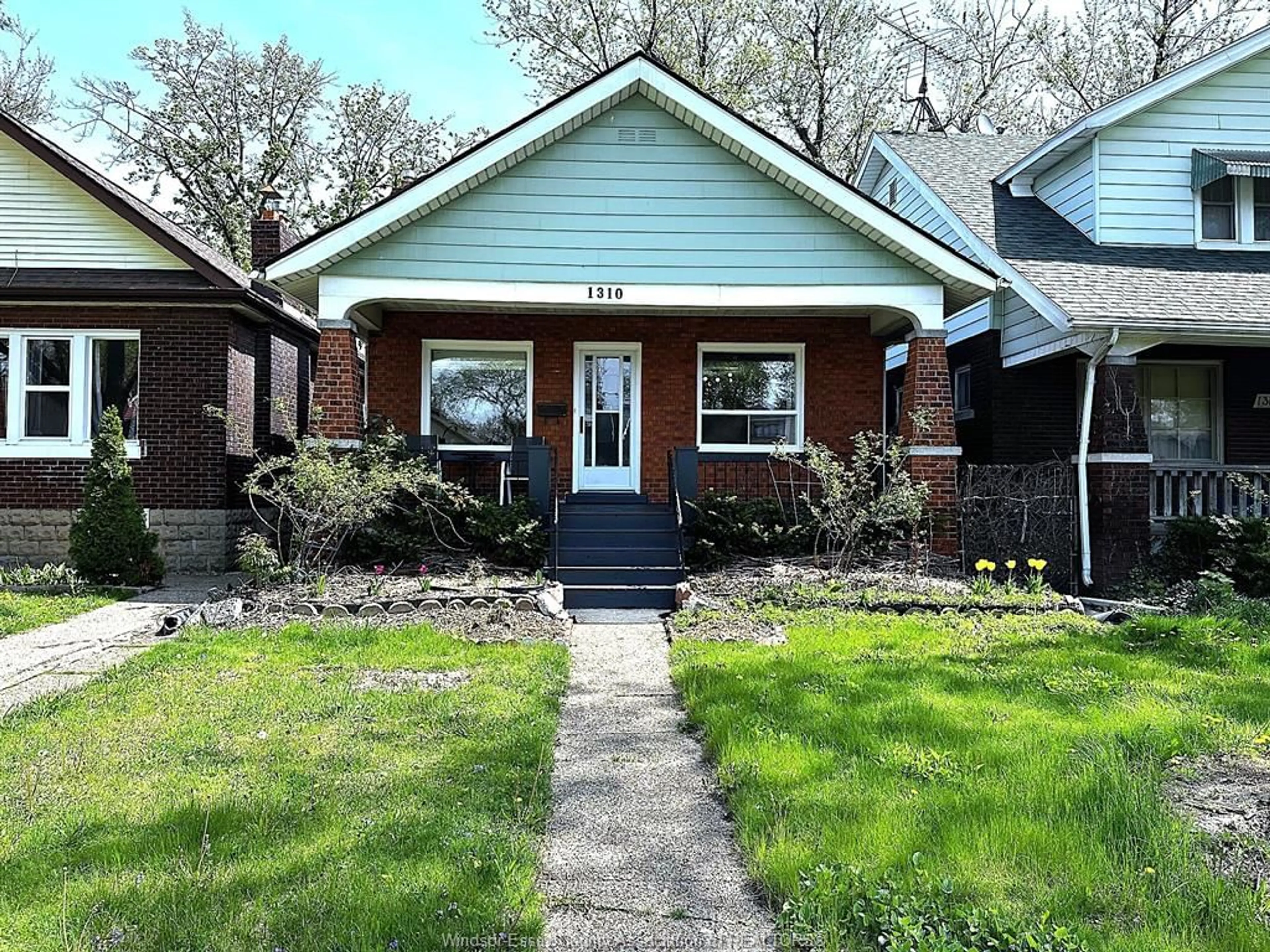 Home with brick exterior material, street for 1310 Bruce, Windsor Ontario N8X 1X3