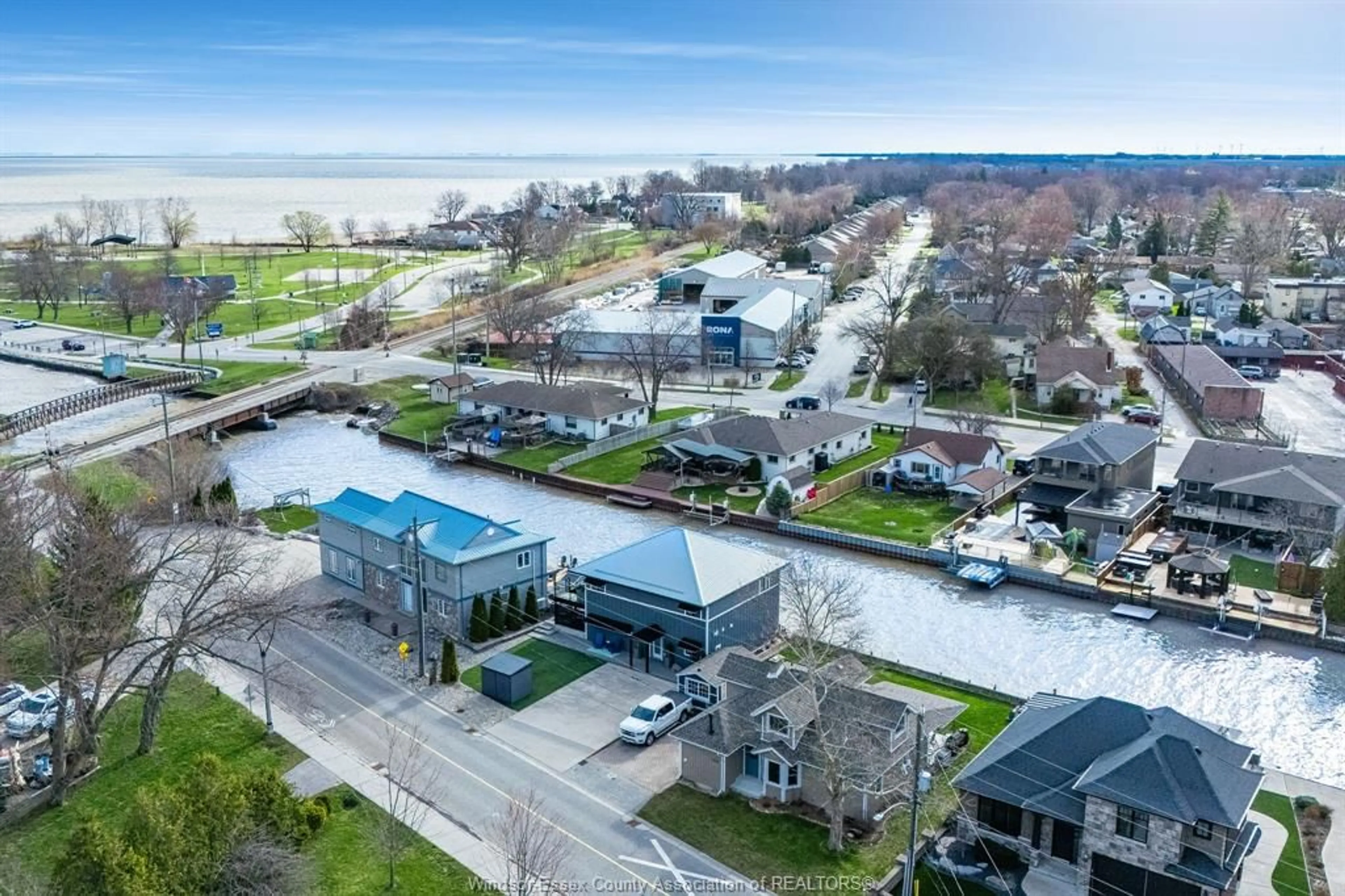 A pic from outside/outdoor area/front of a property/back of a property/a pic from drone, water/lake/river/ocean view for 145 West River St, Belle River Ontario N8L 0J6