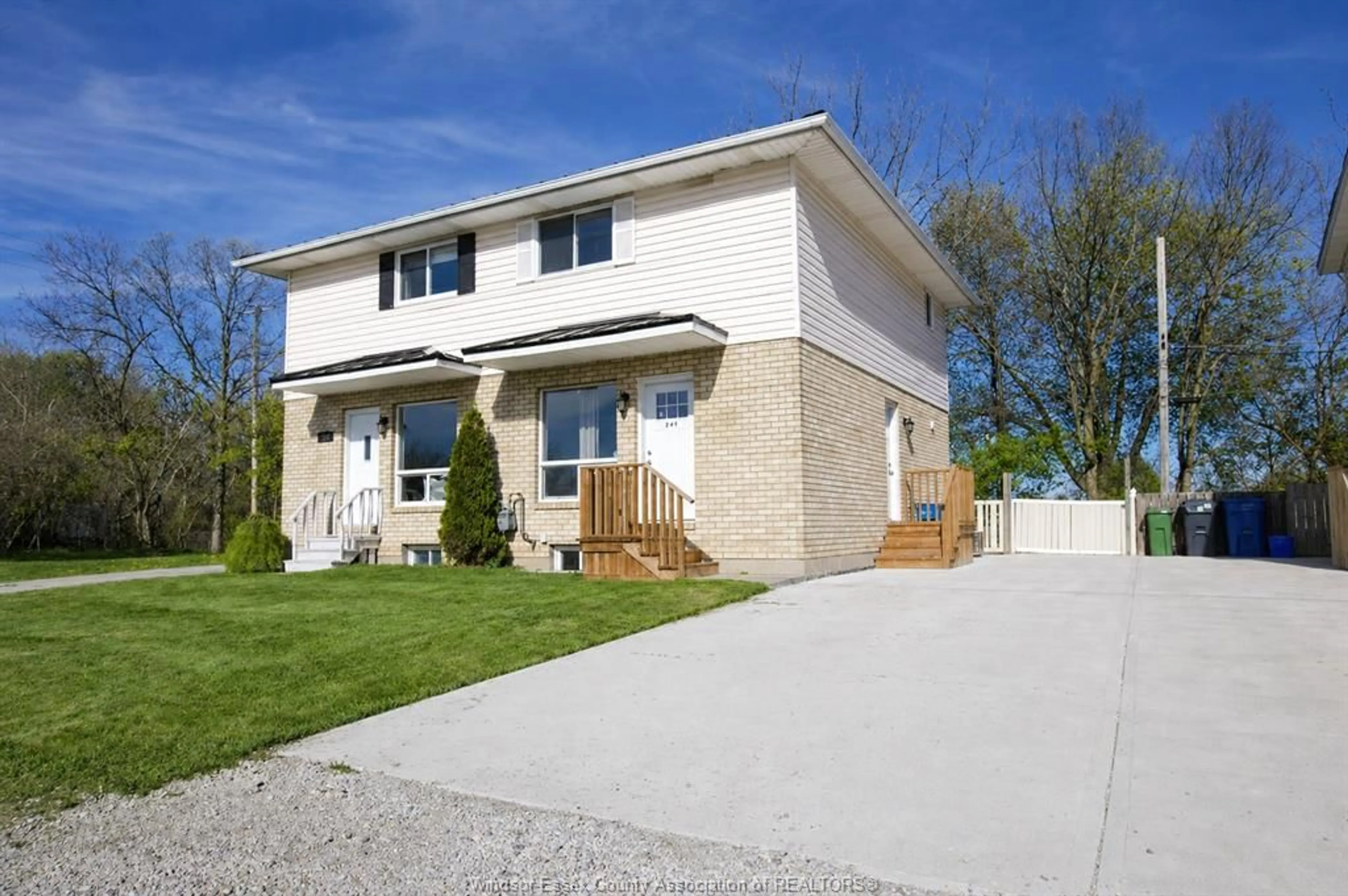 Home with vinyl exterior material, street for 206-208 Arthur St, Harrow Ontario N0R 1G0