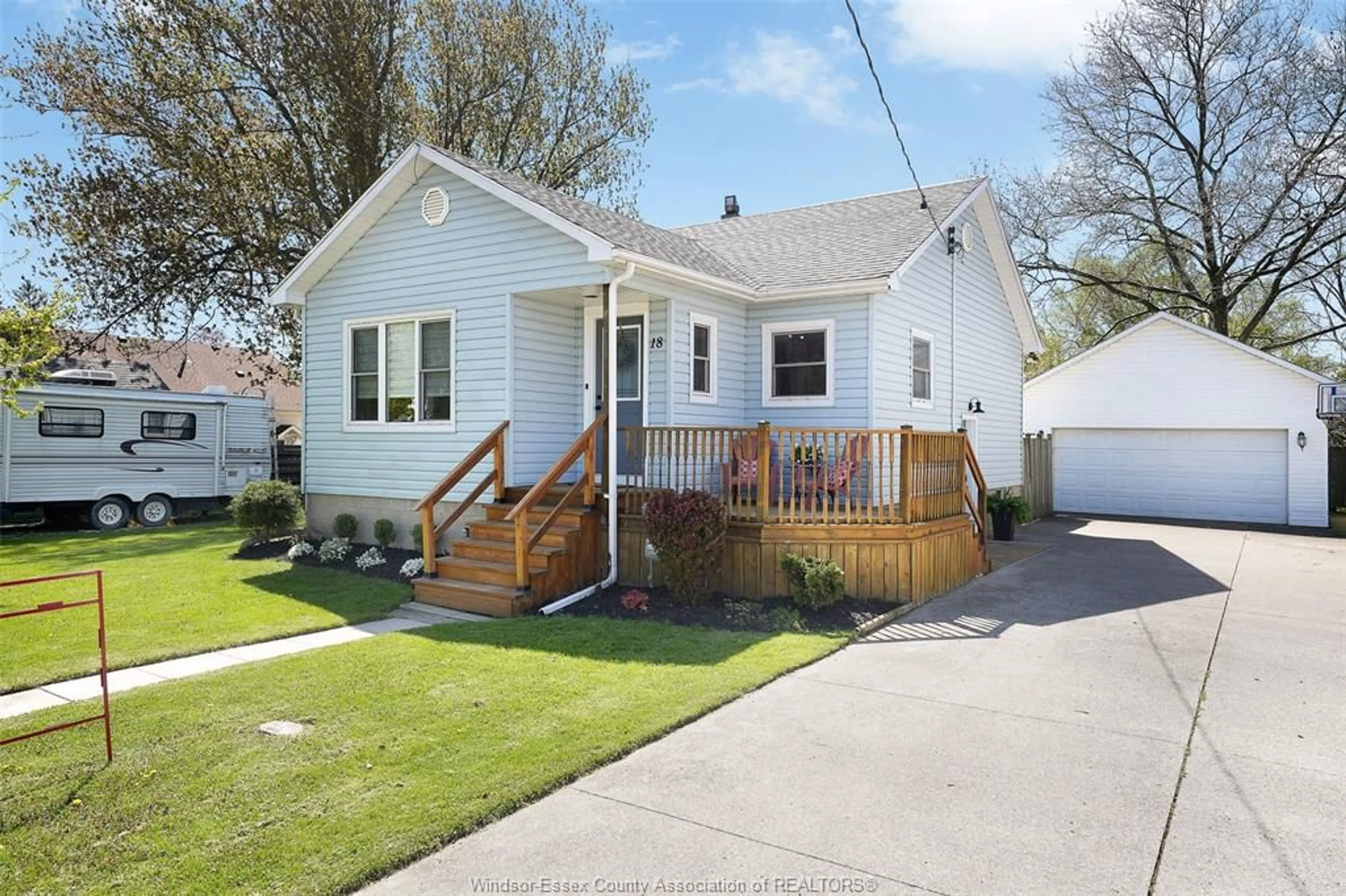 Home with vinyl exterior material, street for 18 WALKER Ave, Wheatley Ontario N0P 2P0