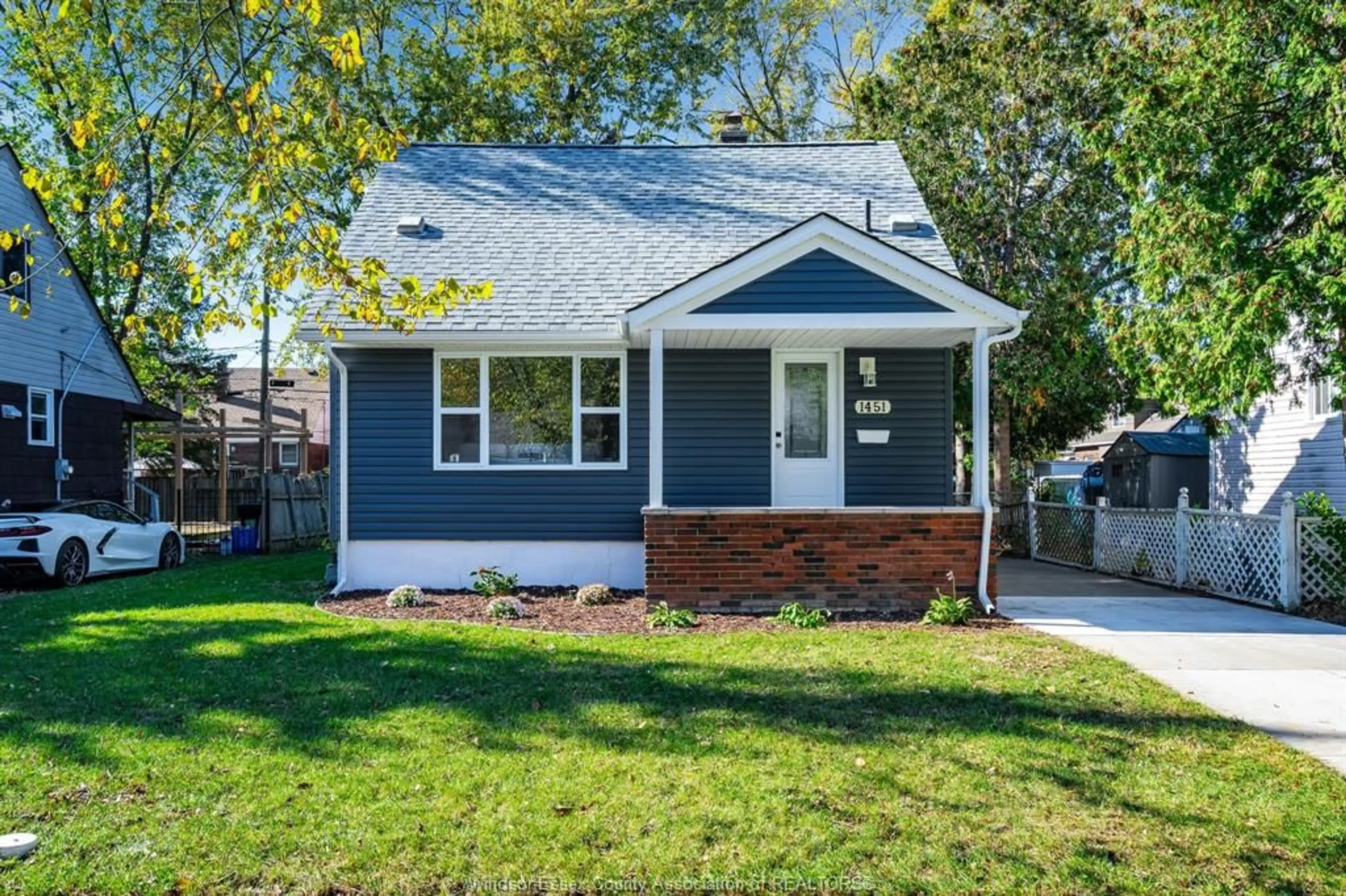 Home with vinyl exterior material, street for 1451 Olive, Windsor Ontario N8Y 4M3