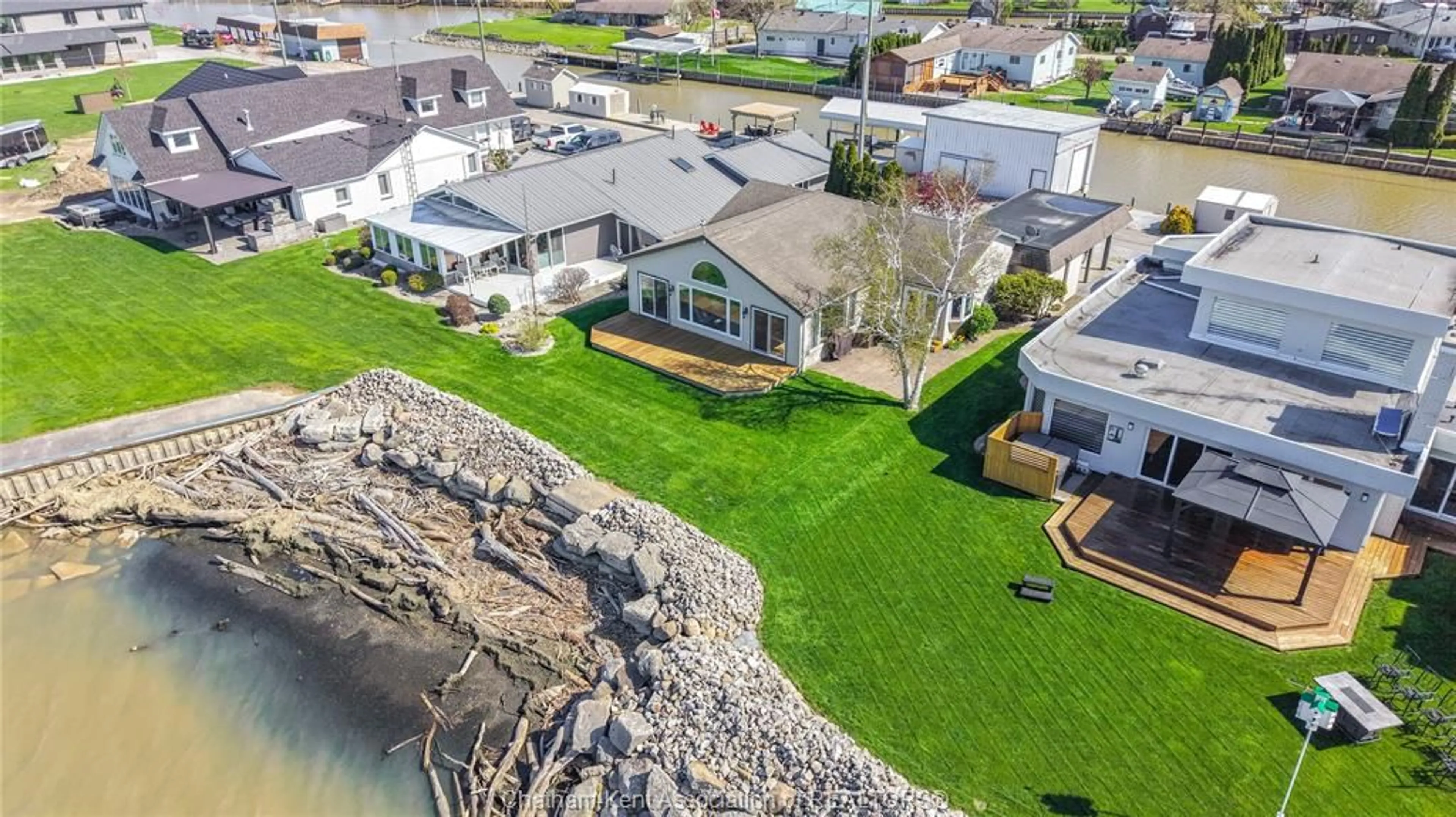 A pic from outside/outdoor area/front of a property/back of a property/a pic from drone, water/lake/river/ocean view for 19060 PENINSULA St, Lighthouse Cove Ontario N0P 2L0