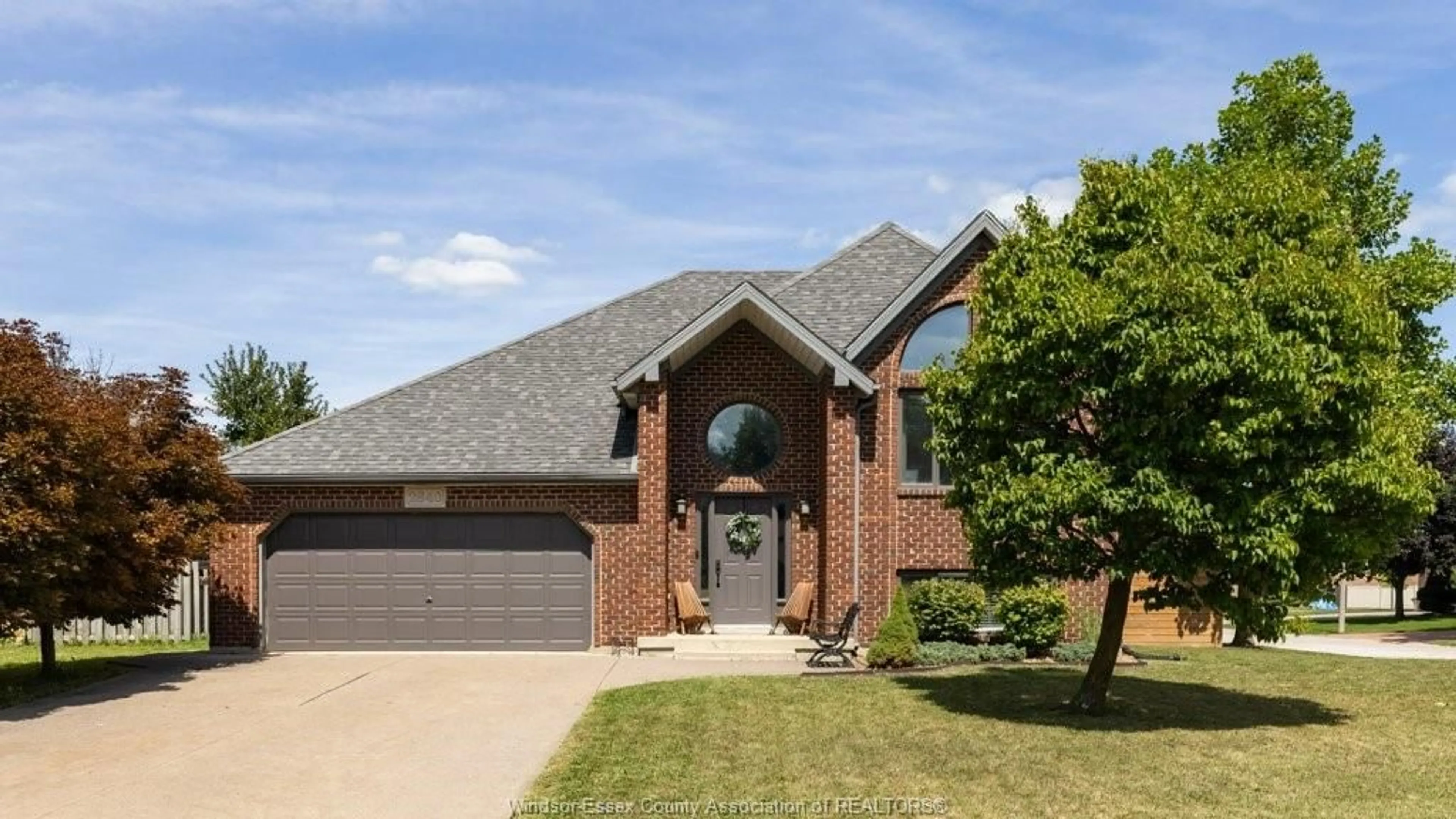 Home with brick exterior material, street for 2840 WILDBERRY Cres, Tecumseh Ontario N9K 1C2