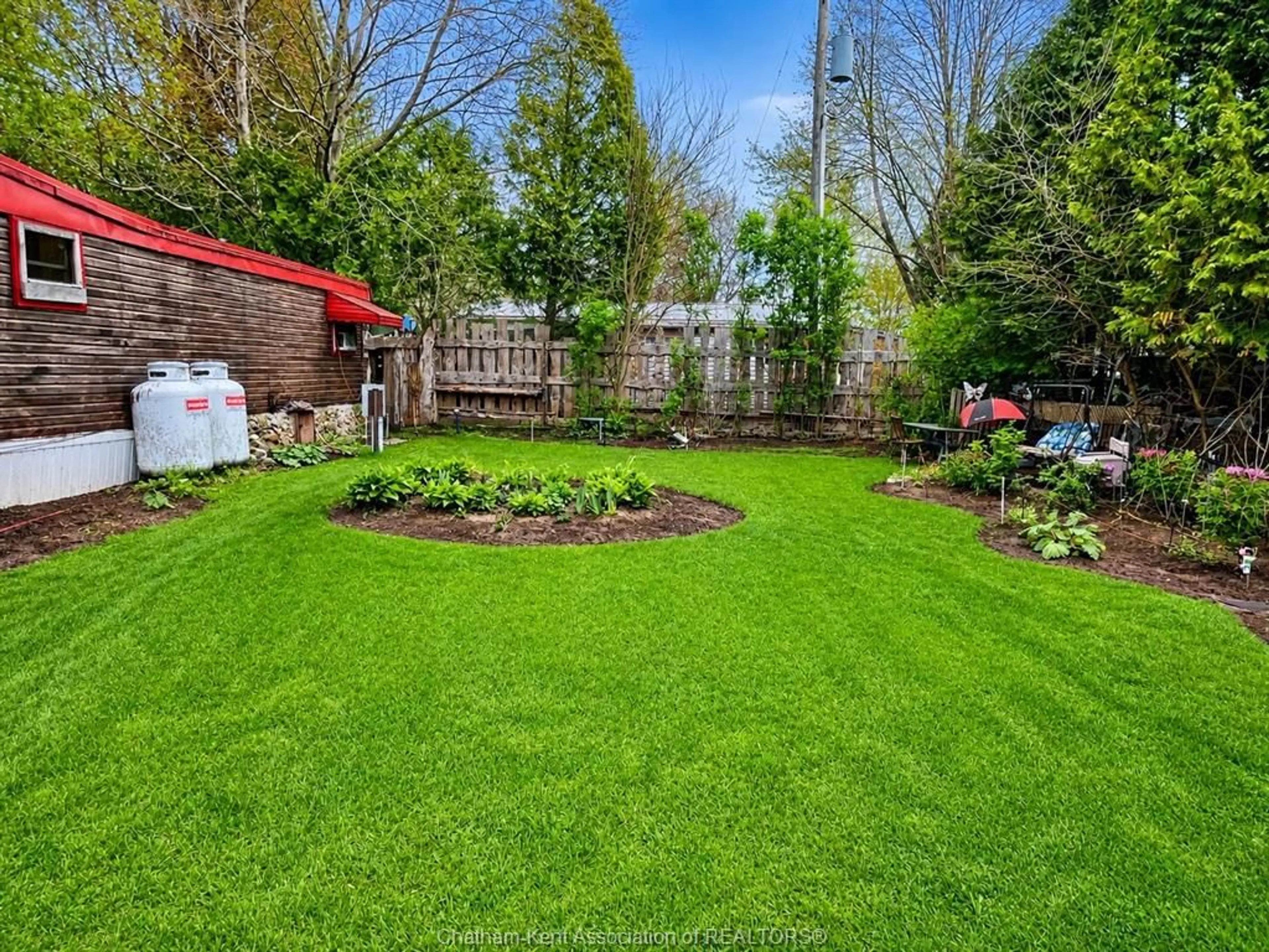 A pic from outside/outdoor area/front of a property/back of a property/a pic from drone, unknown for 29338 Jane Rd #52, Thamesville Ontario N0P 2K0