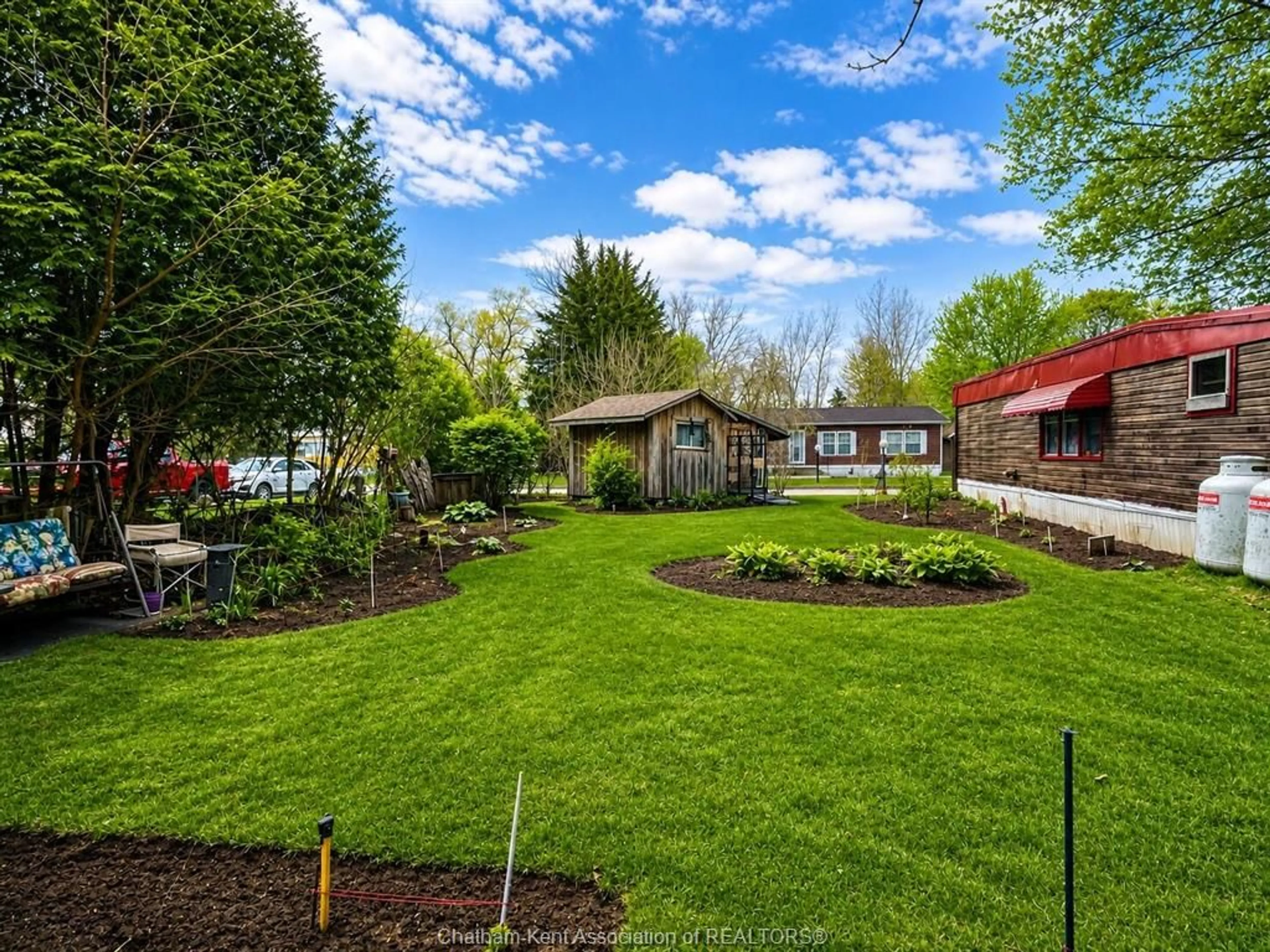 A pic from outside/outdoor area/front of a property/back of a property/a pic from drone, unknown for 29338 Jane Rd #52, Thamesville Ontario N0P 2K0