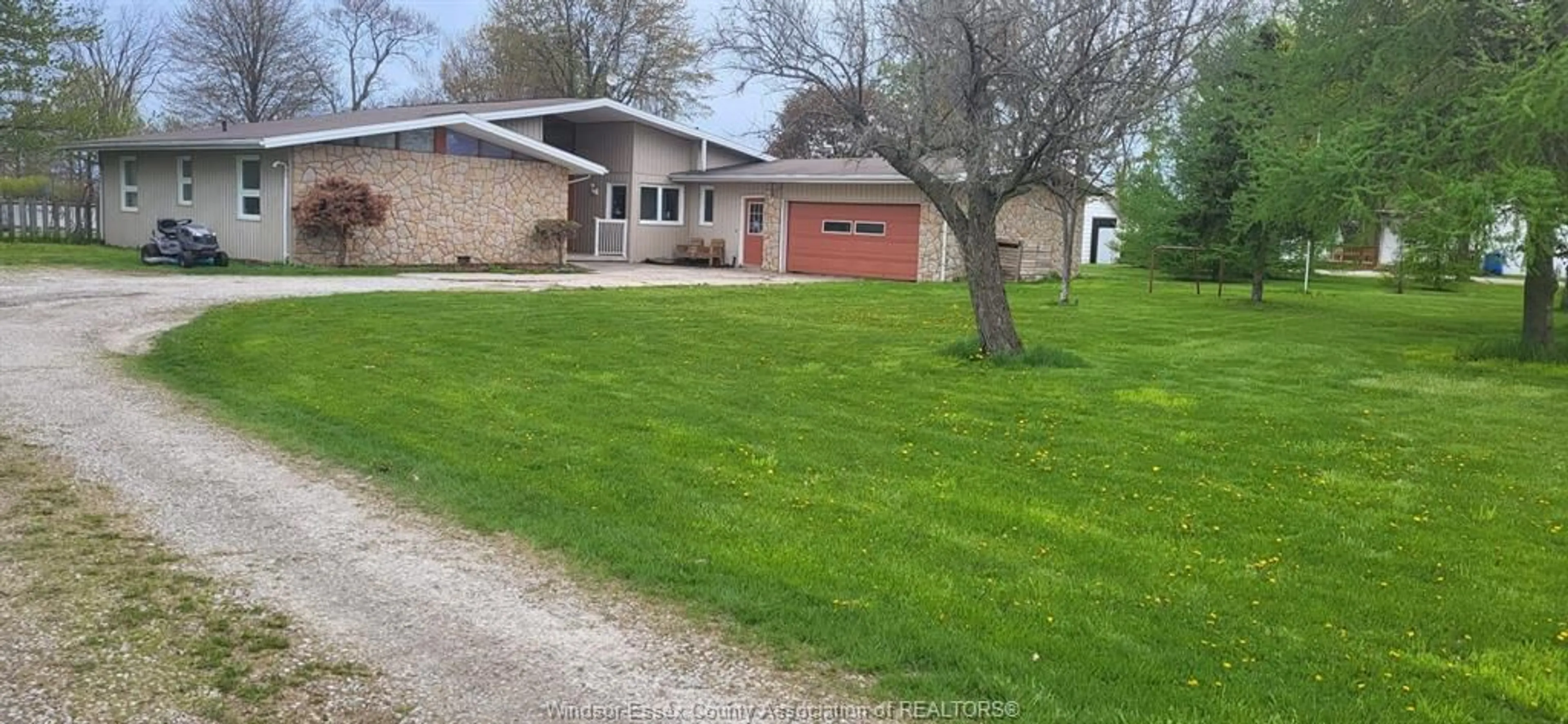 A pic from outside/outdoor area/front of a property/back of a property/a pic from drone, street for 618 MERSEA RD 8, Leamington Ontario N0P 2J0