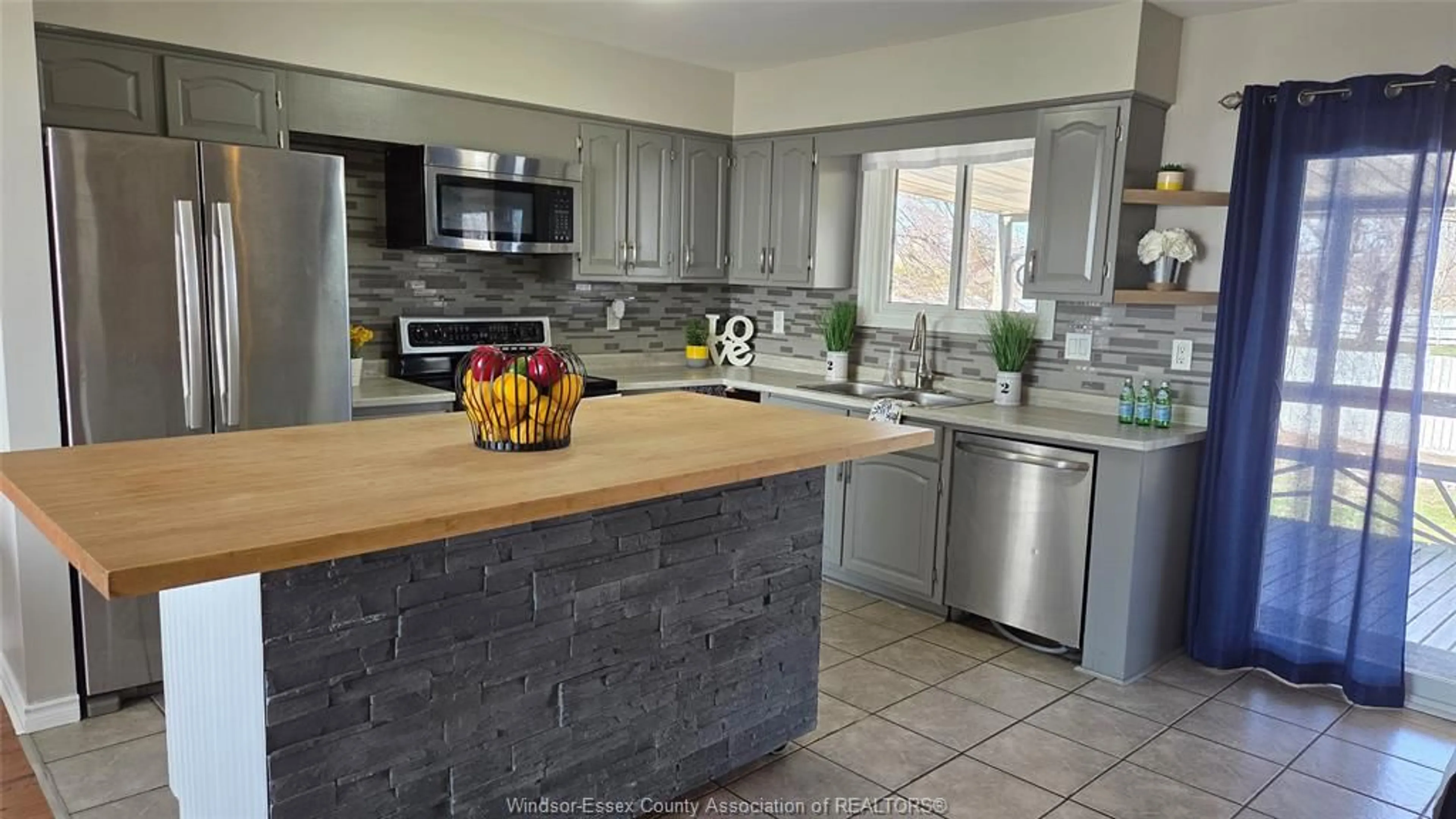 Open concept kitchen, ceramic/tile floor for 9569 Malden rd, LaSalle Ontario N9J 2W5