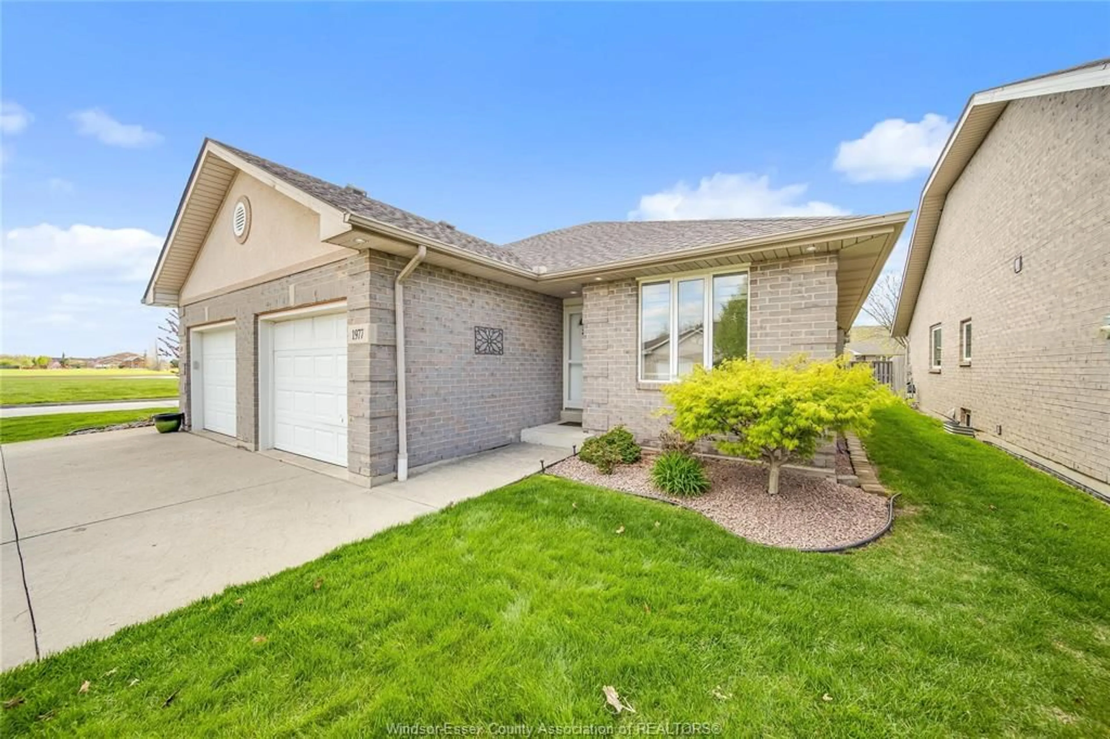 Home with brick exterior material, street for 1977 KIRKLAND Ave, Windsor Ontario N8P 1P7