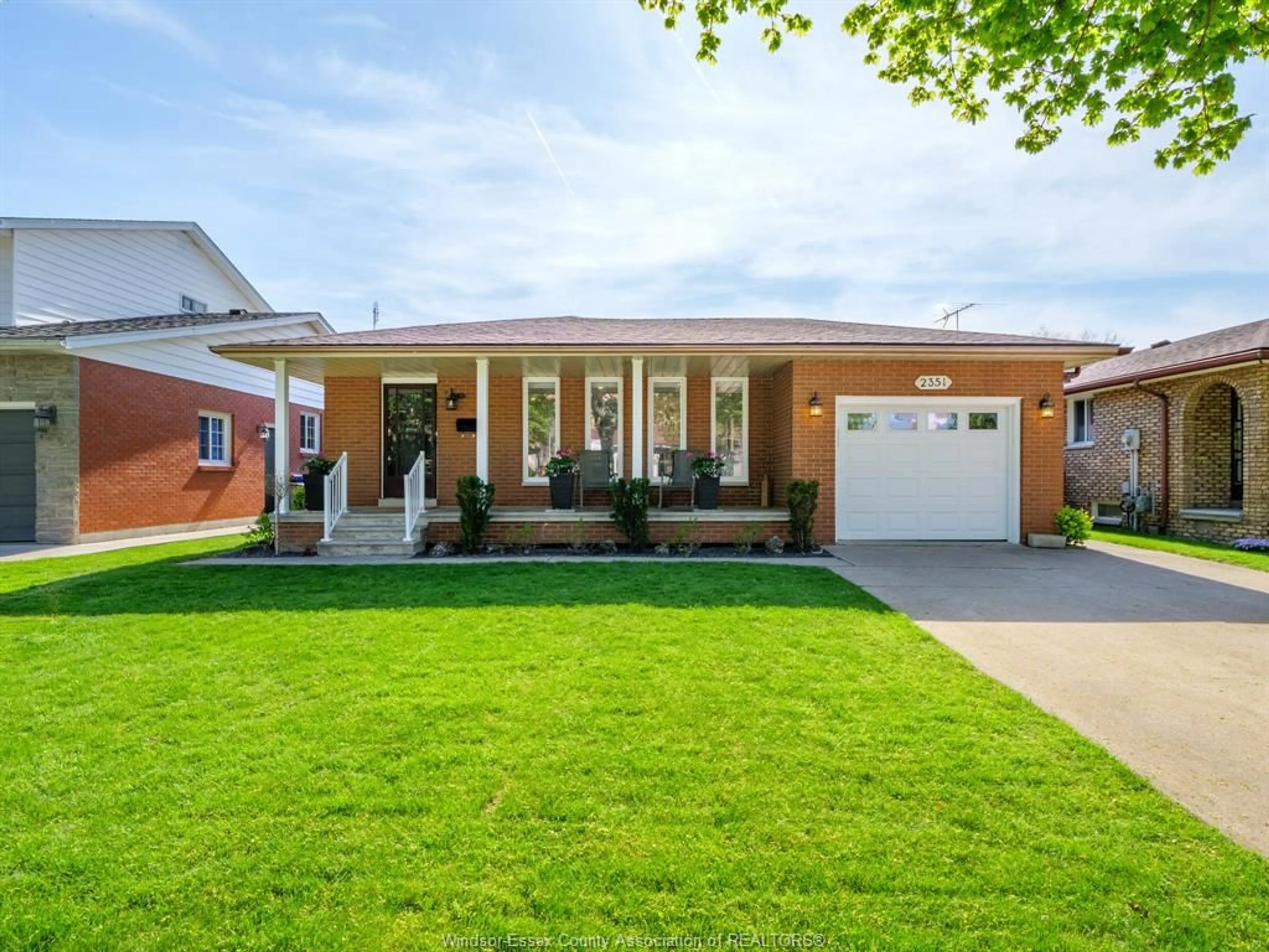 Home with brick exterior material, street for 2351 SANTOS Dr, Windsor Ontario N9G 2J7