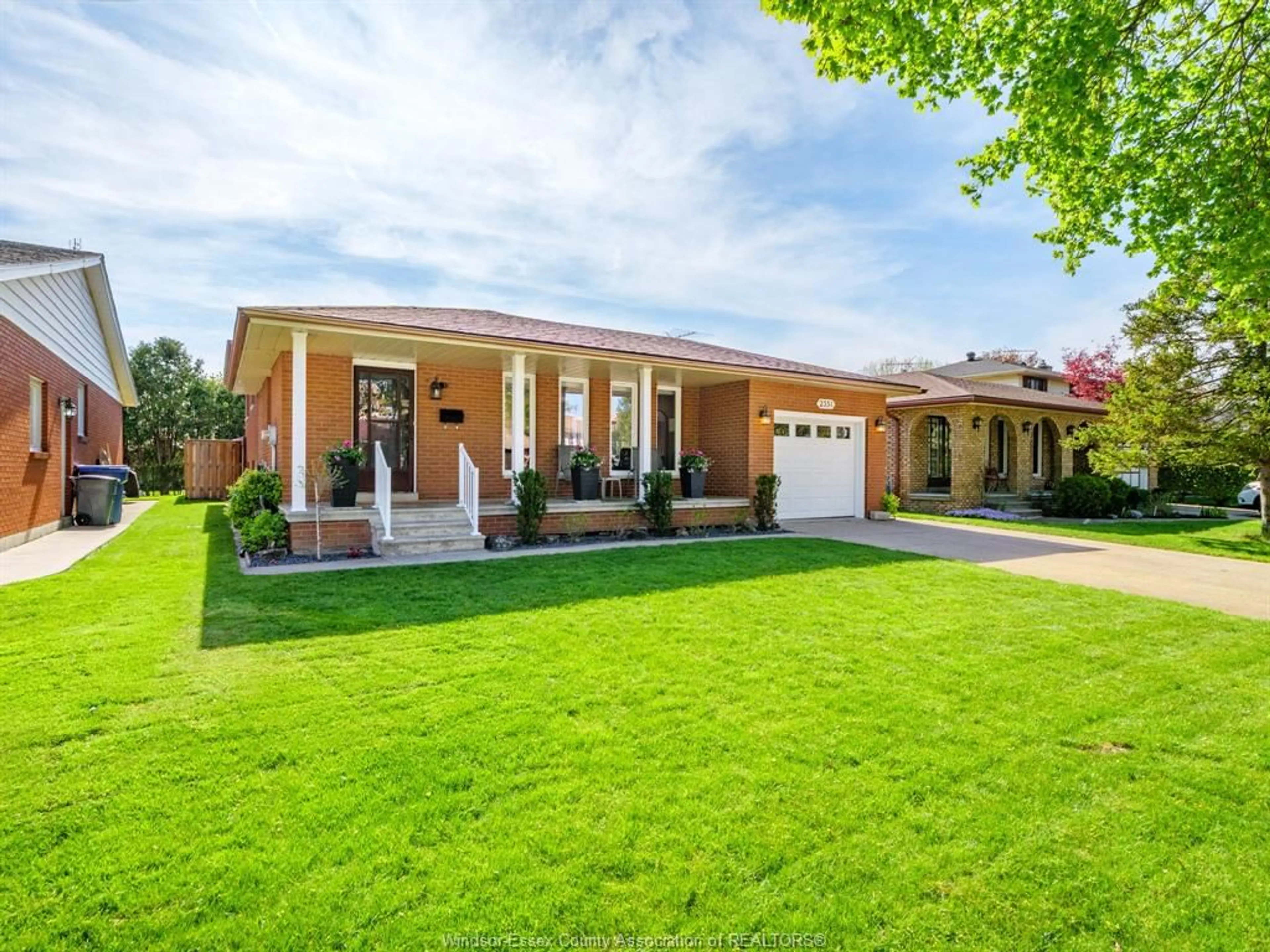 Home with brick exterior material, street for 2351 SANTOS Dr, Windsor Ontario N9G 2J7