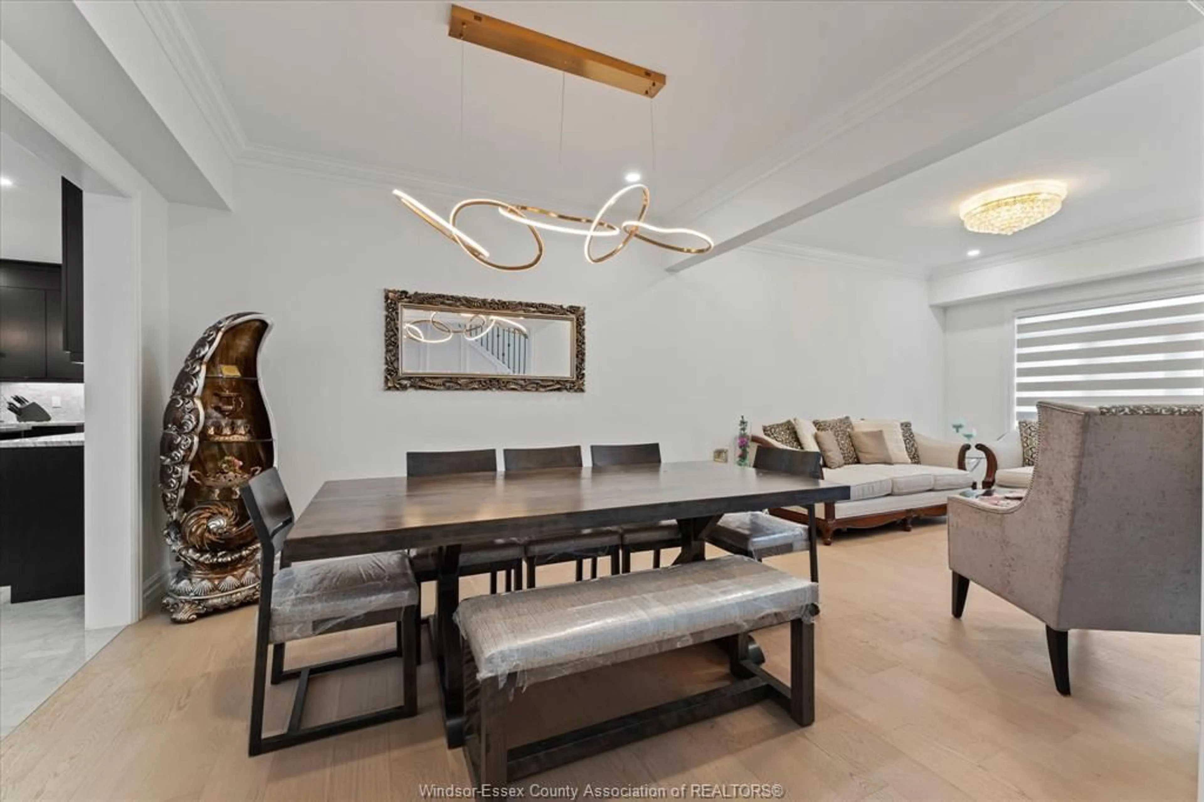 Dining room, wood/laminate floor for 570 ORCHARD Cres, Windsor Ontario N9E 0B2