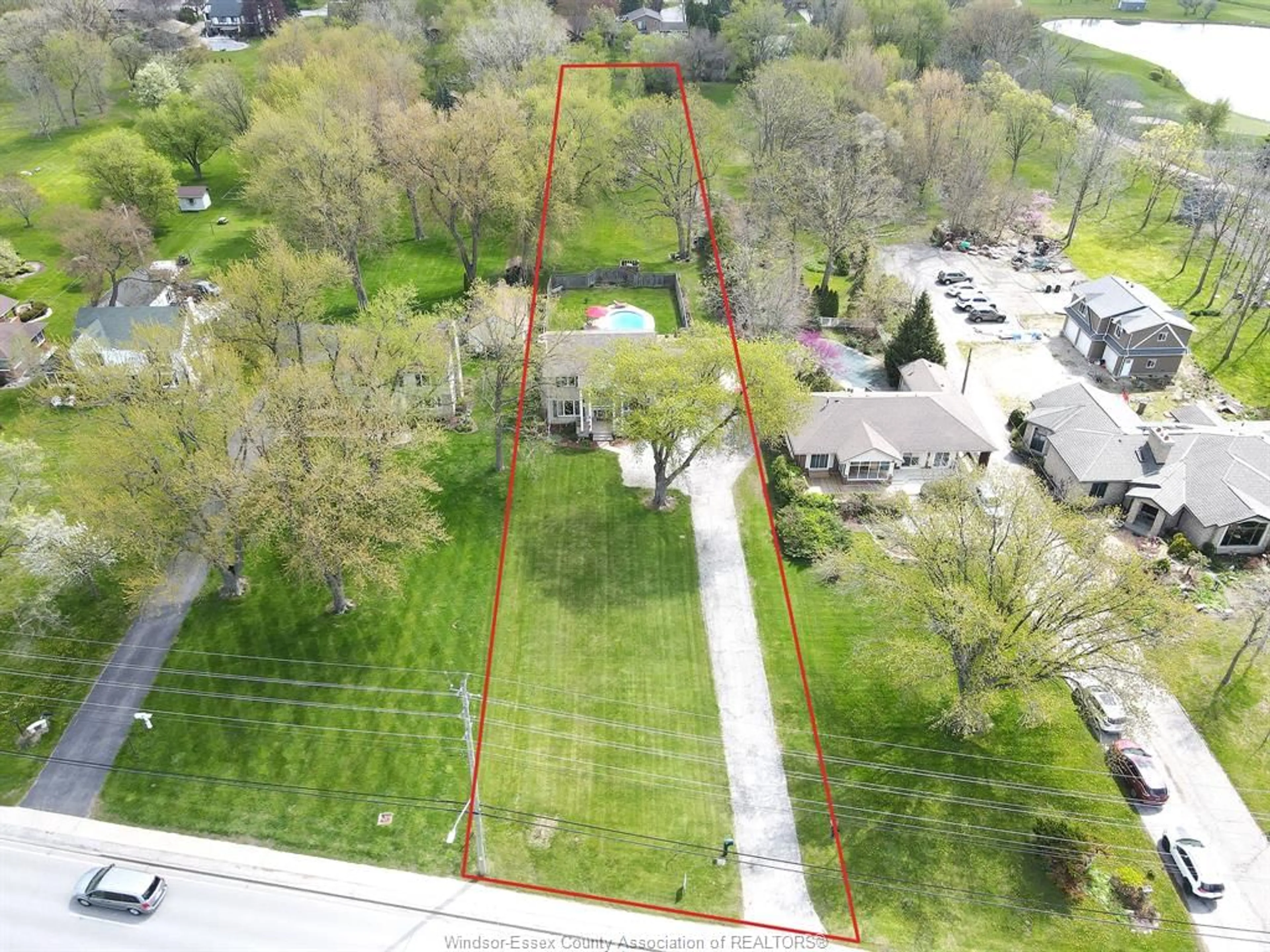 A pic from outside/outdoor area/front of a property/back of a property/a pic from drone, street for 885 FRONT RD. N., Amherstburg Ontario N9V 2V6