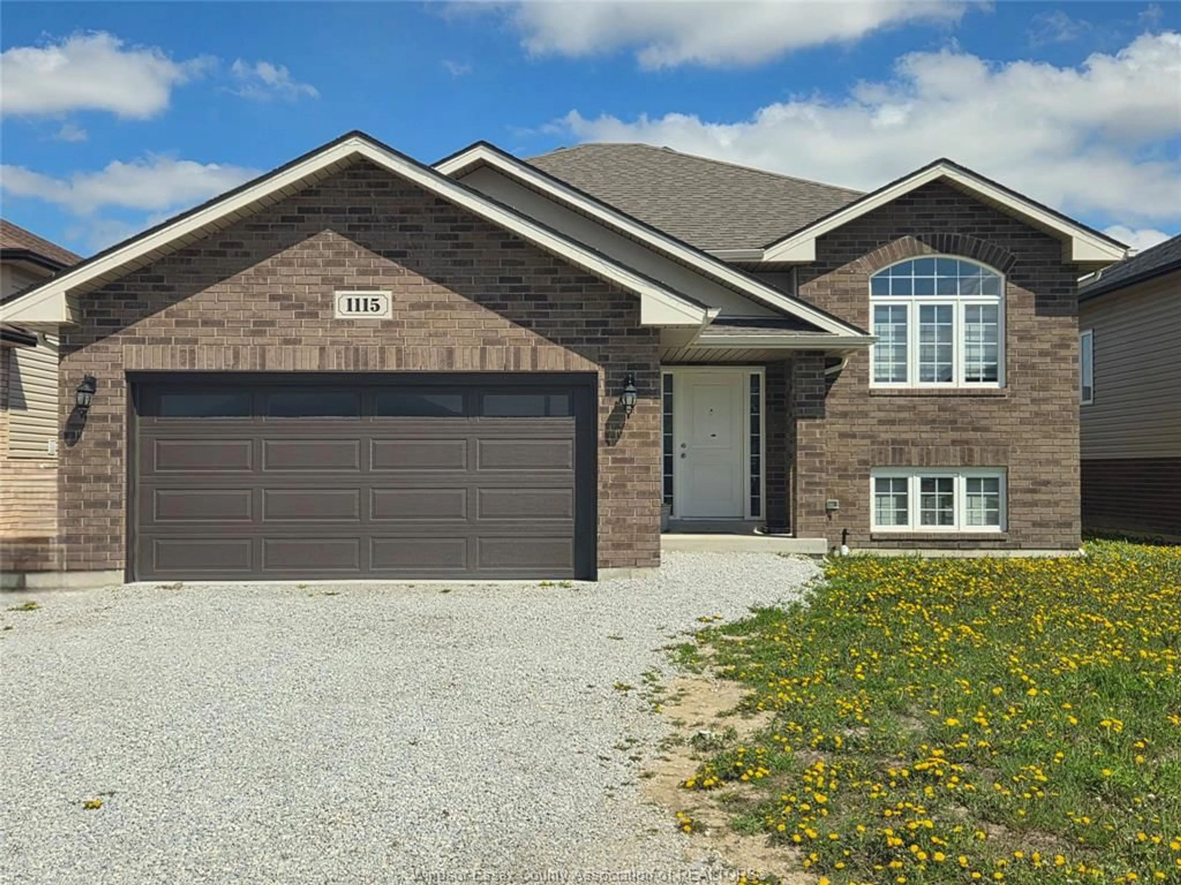 Home with brick exterior material, street for 1115 Aspen Ridge Cres, Lakeshore Ontario N8L 1B1