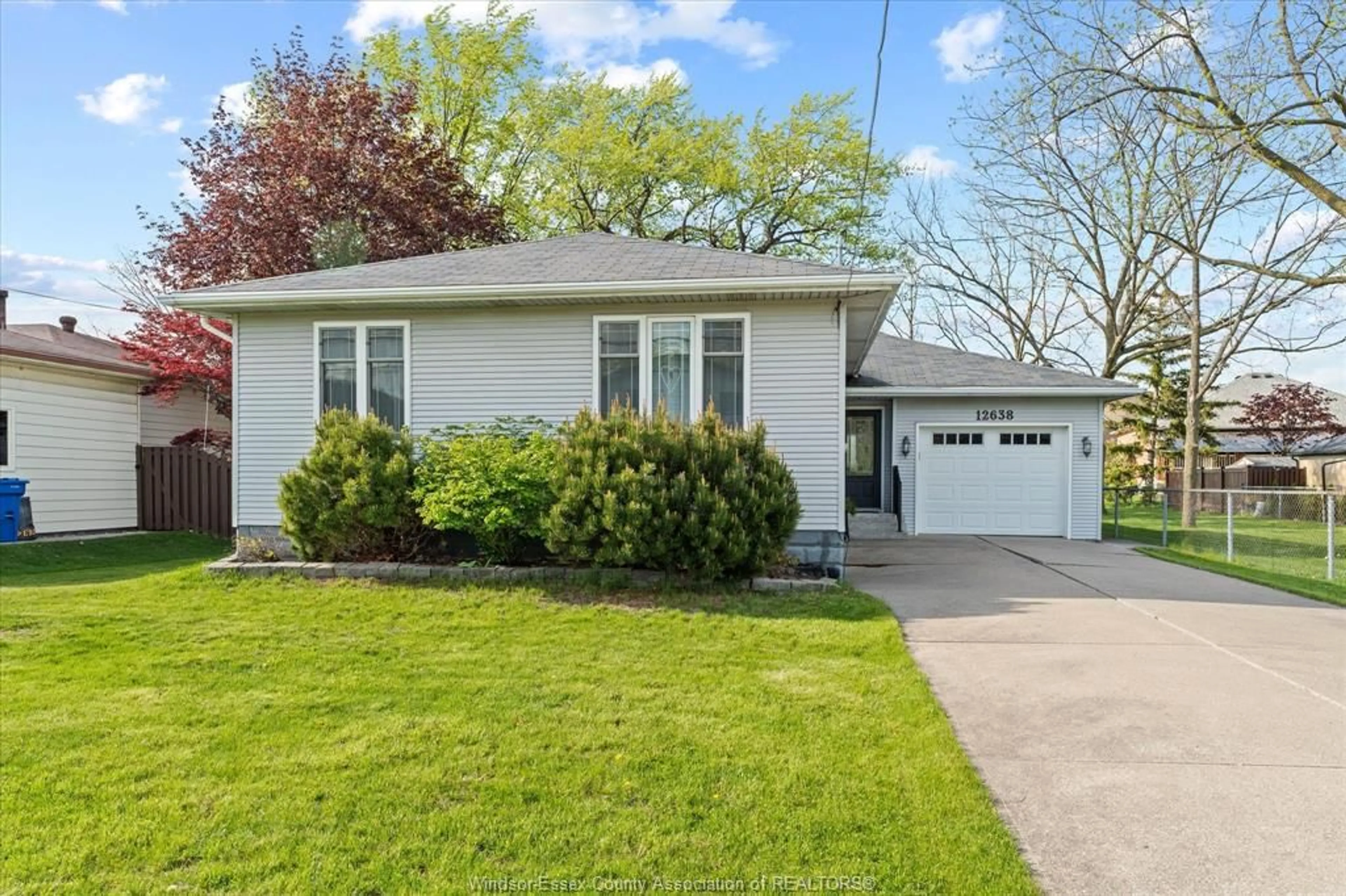 Home with vinyl exterior material, street for 12638 St. Thomas St, Tecumseh Ontario N8N 1J1