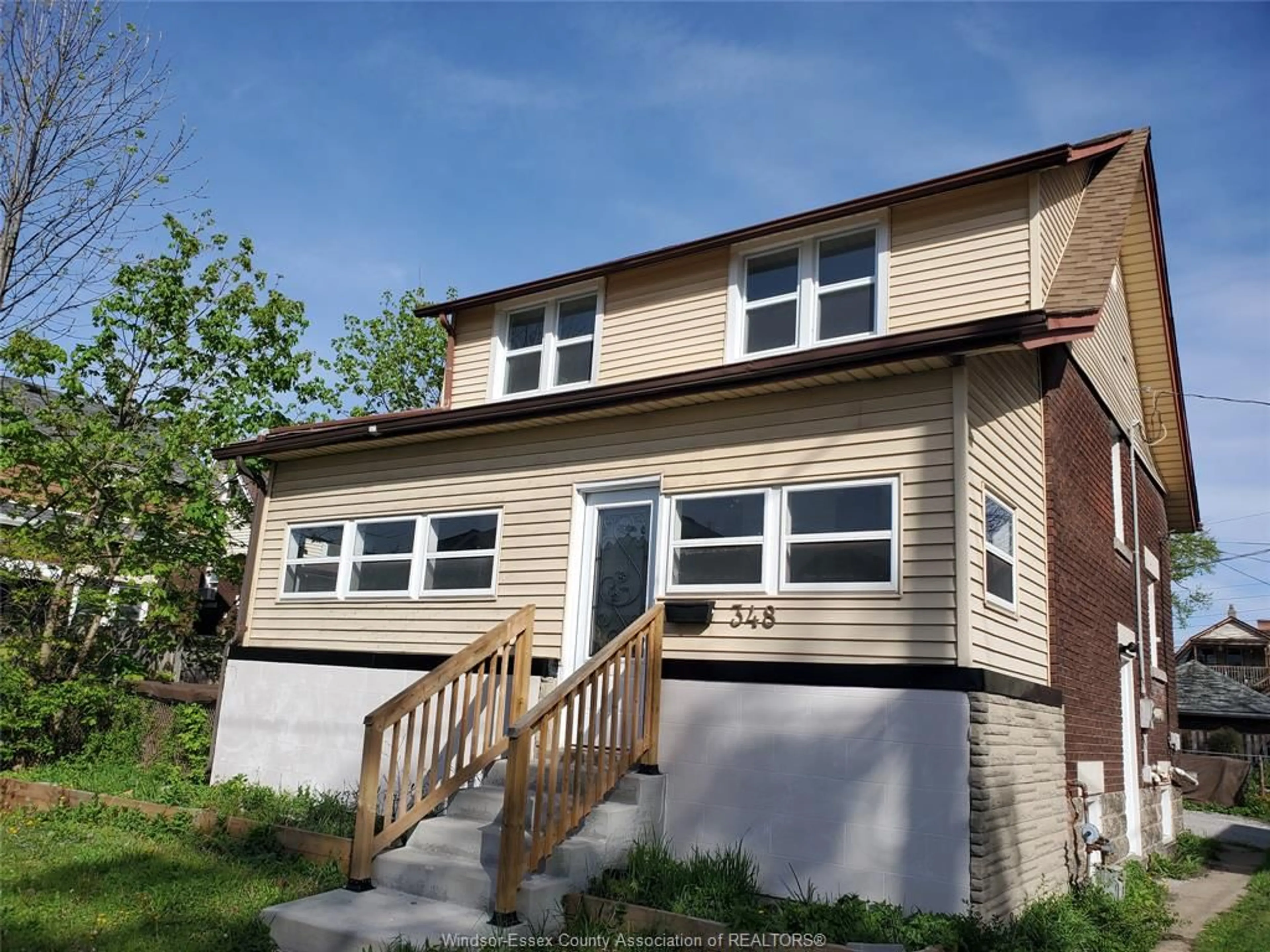 Home with vinyl exterior material, street for 348 CAROLINE, Windsor Ontario N9A 6A4