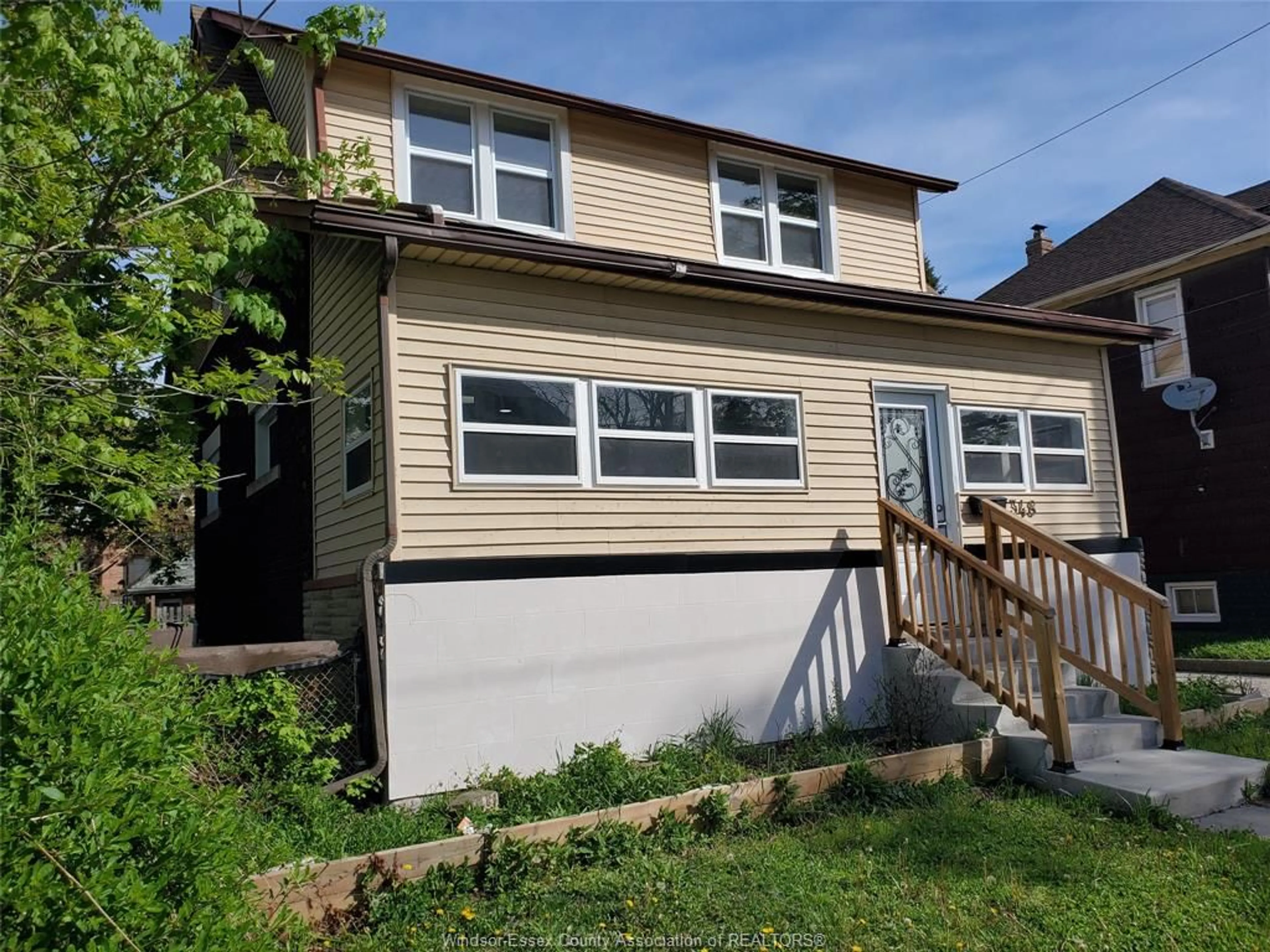 Home with vinyl exterior material, street for 348 CAROLINE, Windsor Ontario N9A 6A4