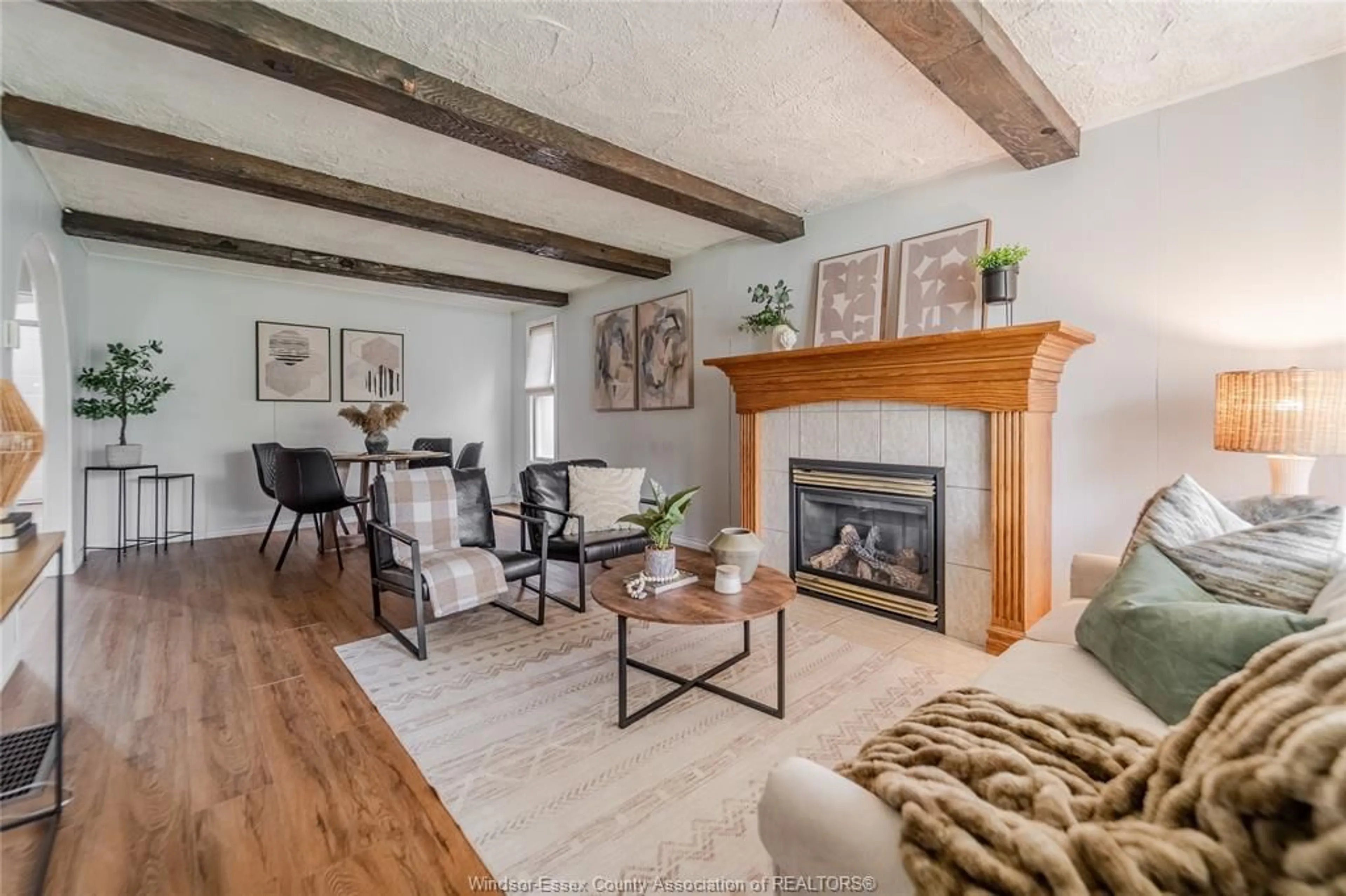 Living room with furniture, wood/laminate floor for 1564 Buckingham Dr, Windsor Ontario N8T 2A4