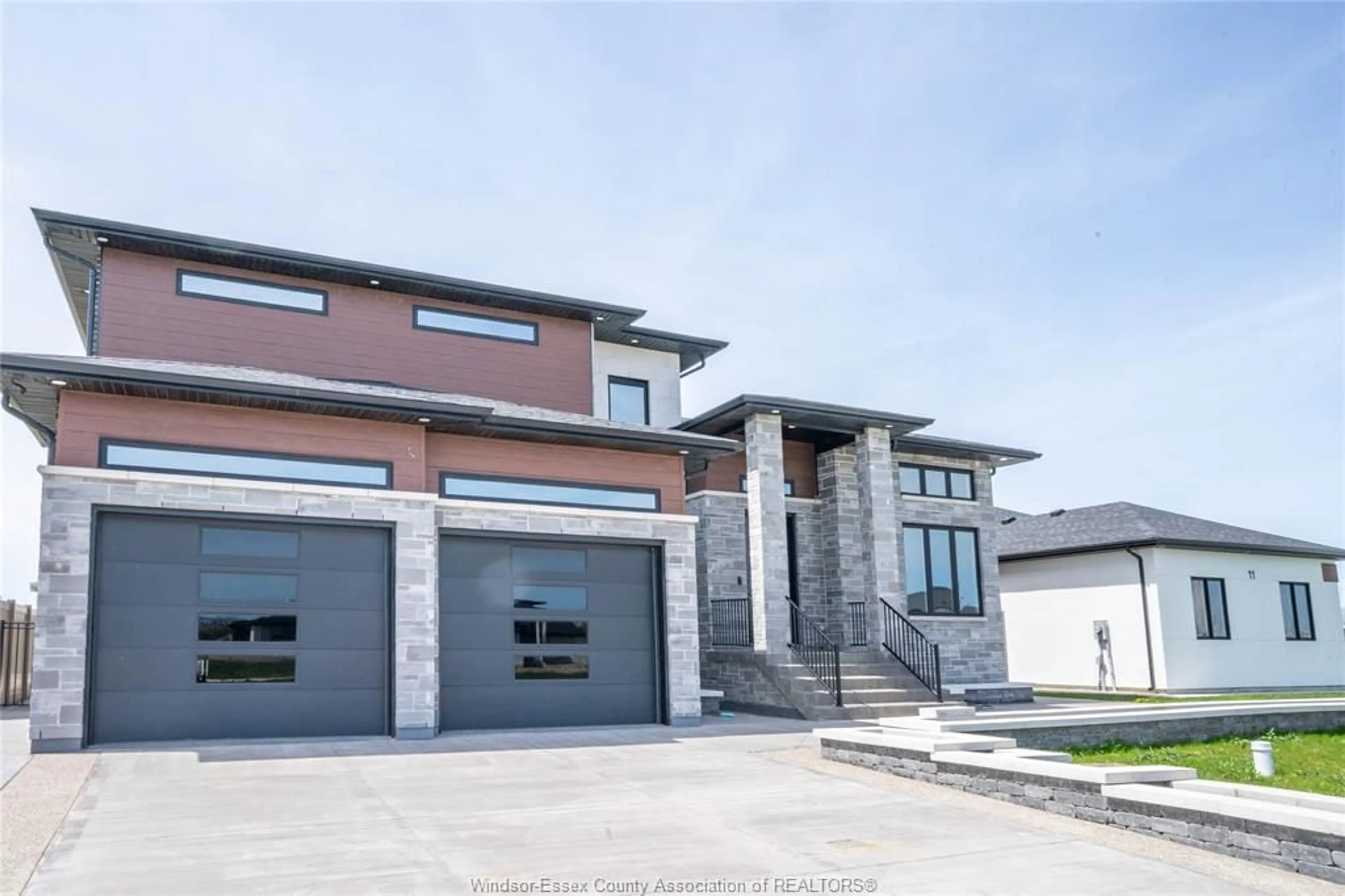 Home with brick exterior material, street for 9 CYPRESS POINTE, Leamington Ontario N8H 0C7