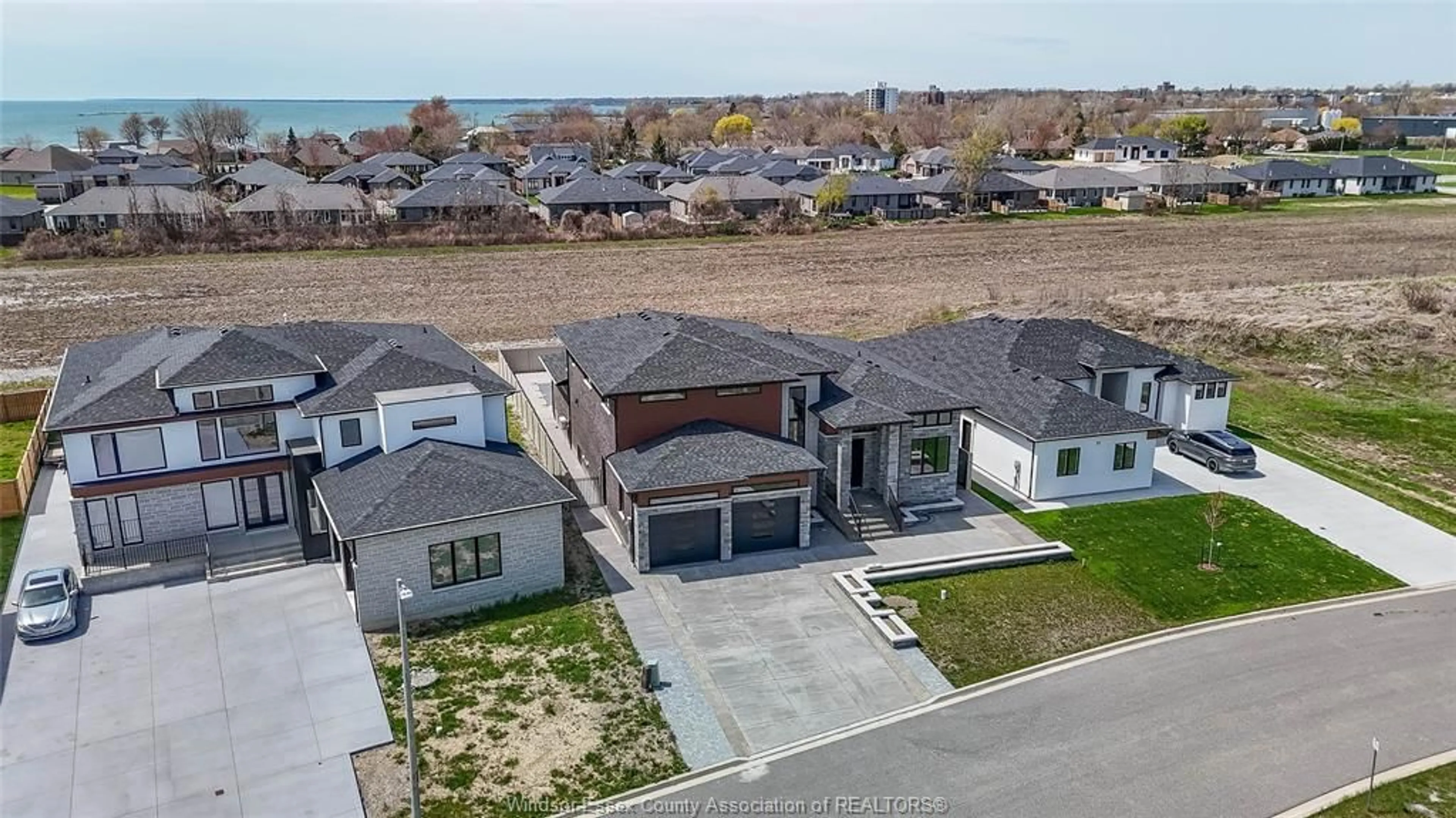 A pic from outside/outdoor area/front of a property/back of a property/a pic from drone, water/lake/river/ocean view for 9 CYPRESS POINTE, Leamington Ontario N8H 0C7