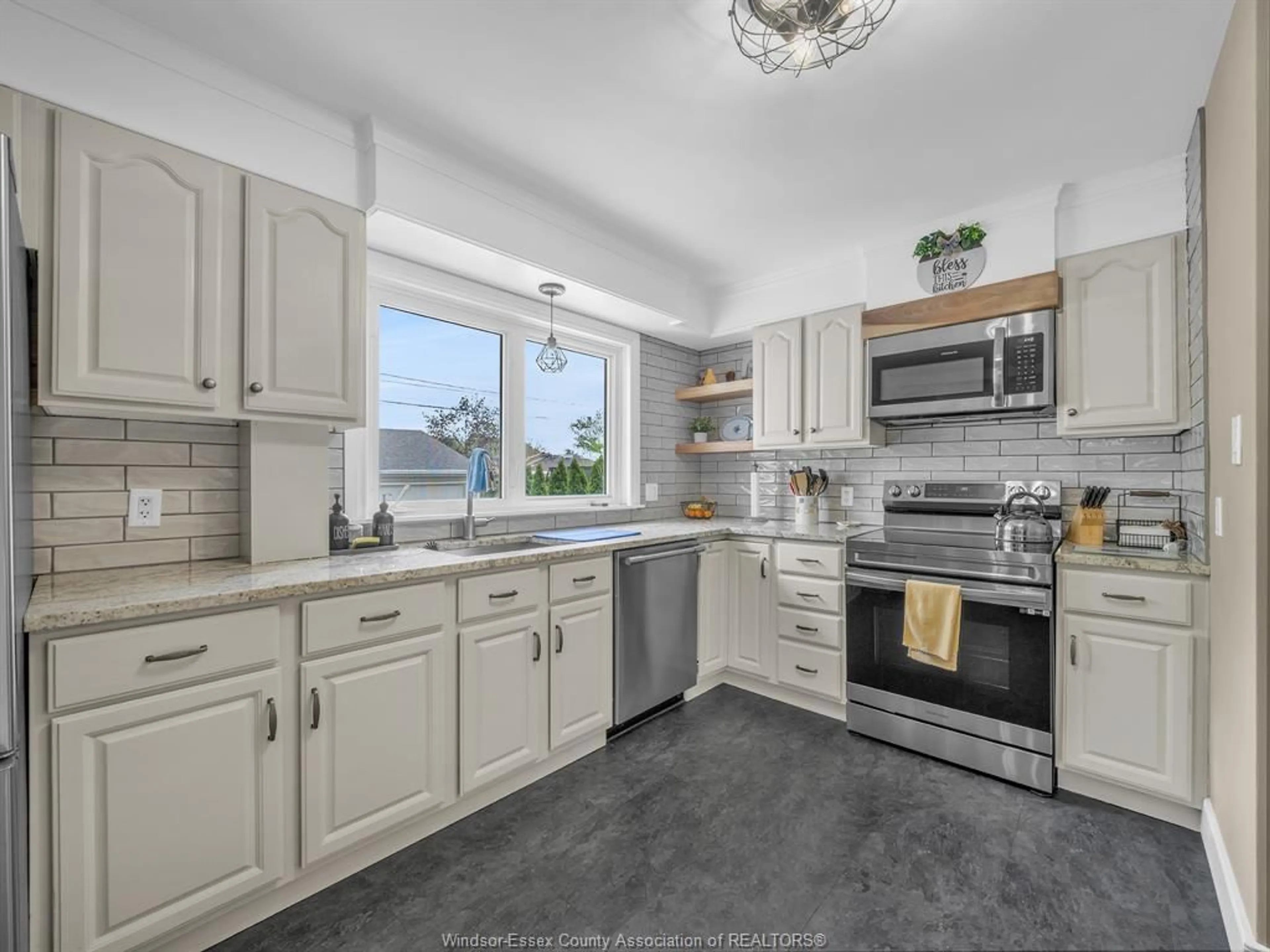 Open concept kitchen, ceramic/tile floor for 1038 JANISSE, Windsor Ontario N8S 2W1